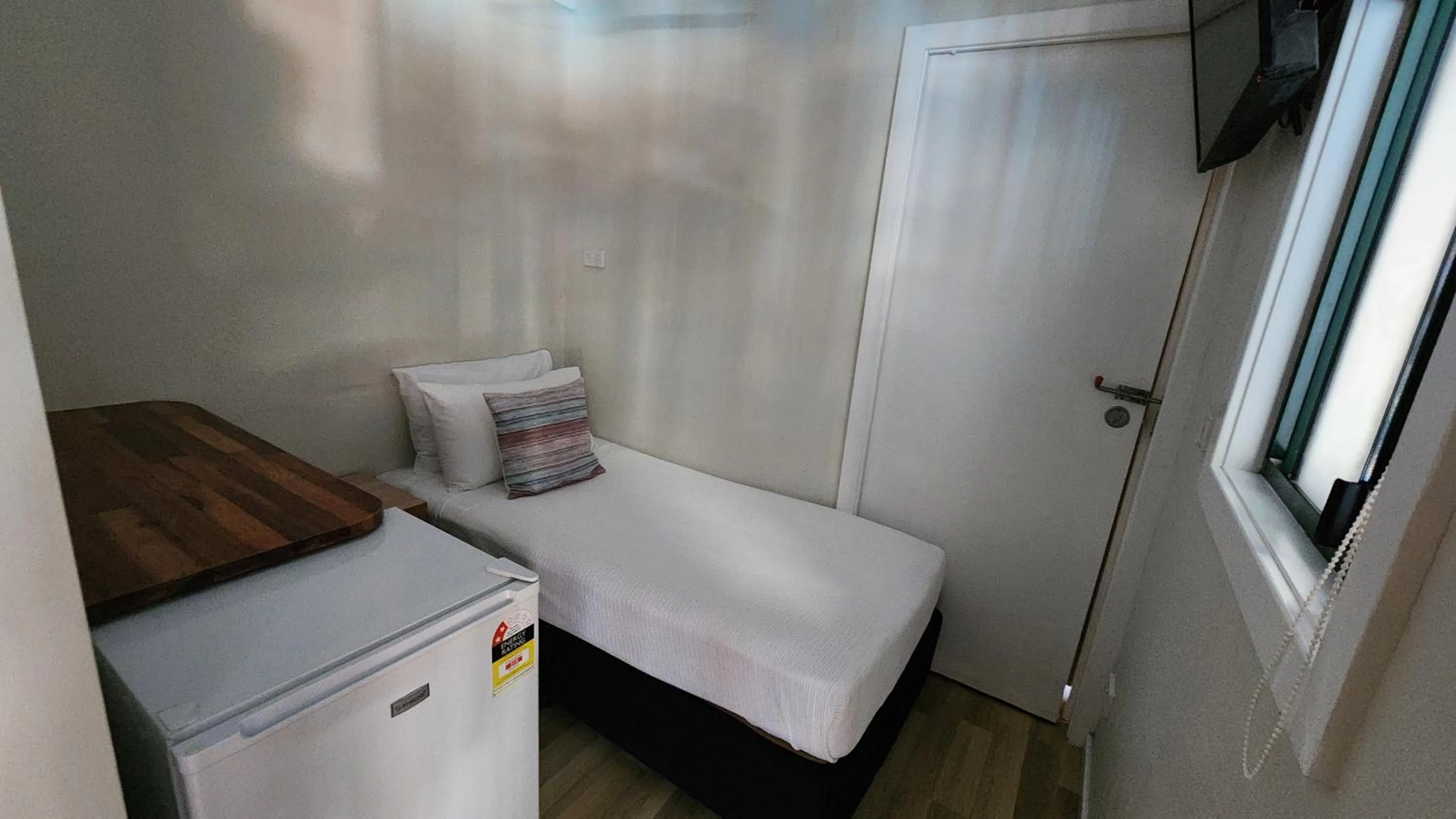 Bed in T's Resort & Motel