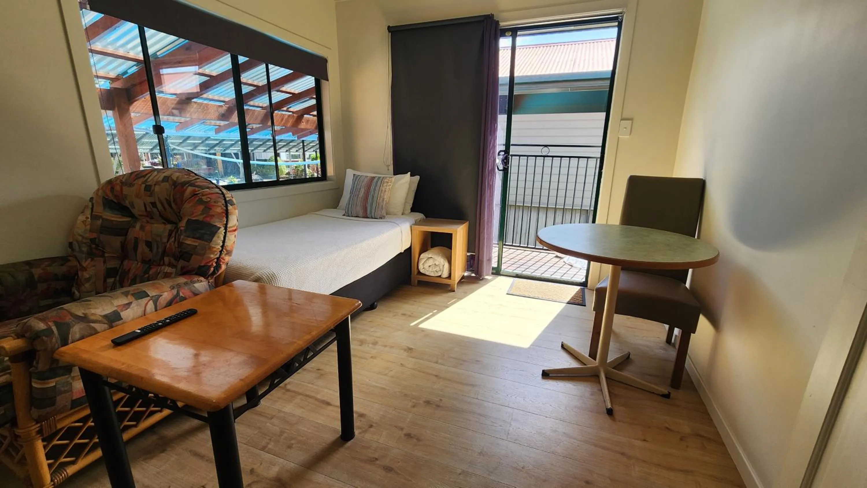 Bed in T's Resort & Motel