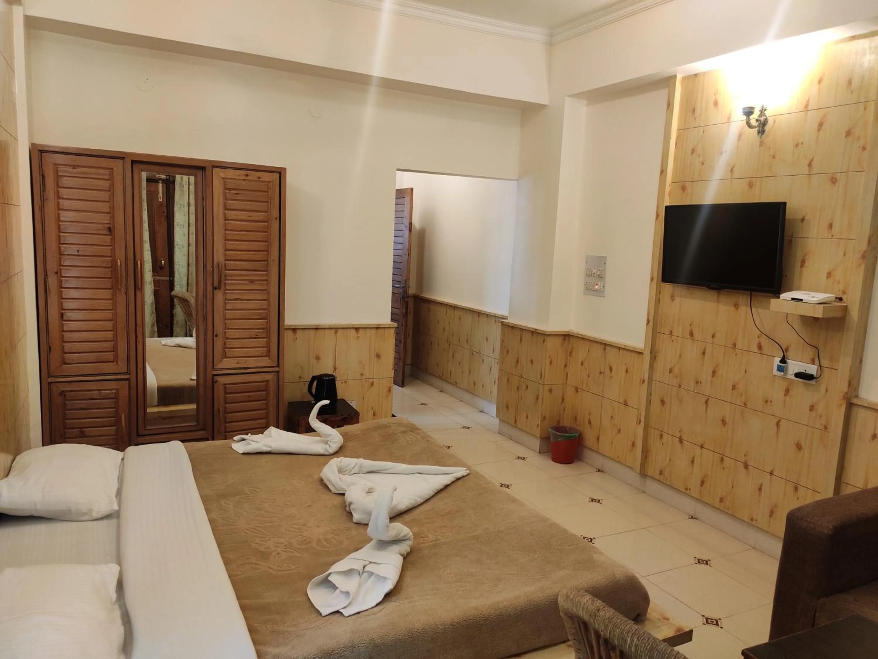 Bed in Greenwoods Inn Mcleodganj #Parking #lift #All Balcony Rooms #Rooftop Terrace #Prime Location # Close to the Triund Trek Point 400 Mtr Head