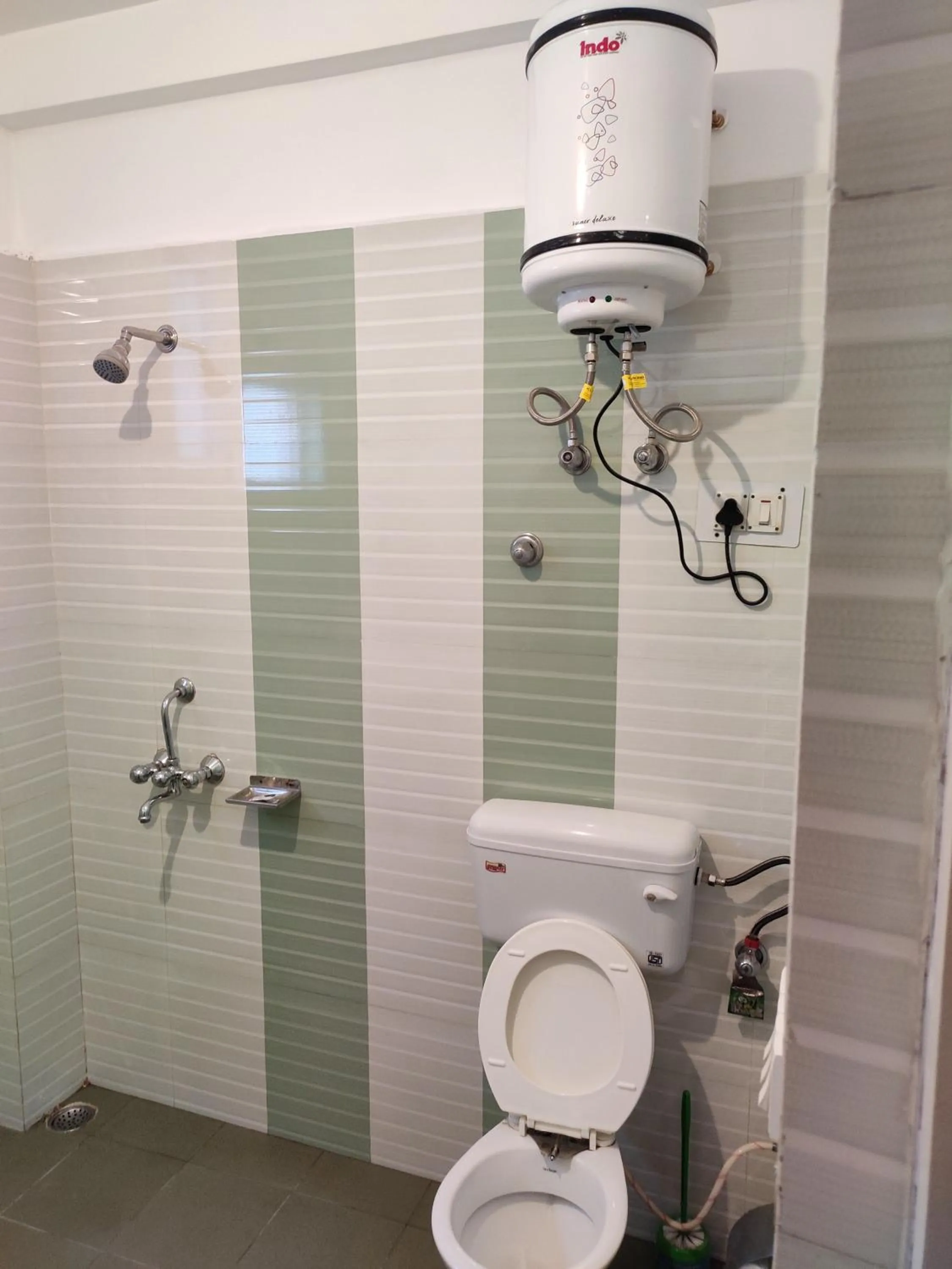 Toilet in Greenwoods Inn Mcleodganj #Parking #lift #All Balcony Rooms #Rooftop Terrace #Prime Location # Close to the Triund Trek Point 400 Mtr Head