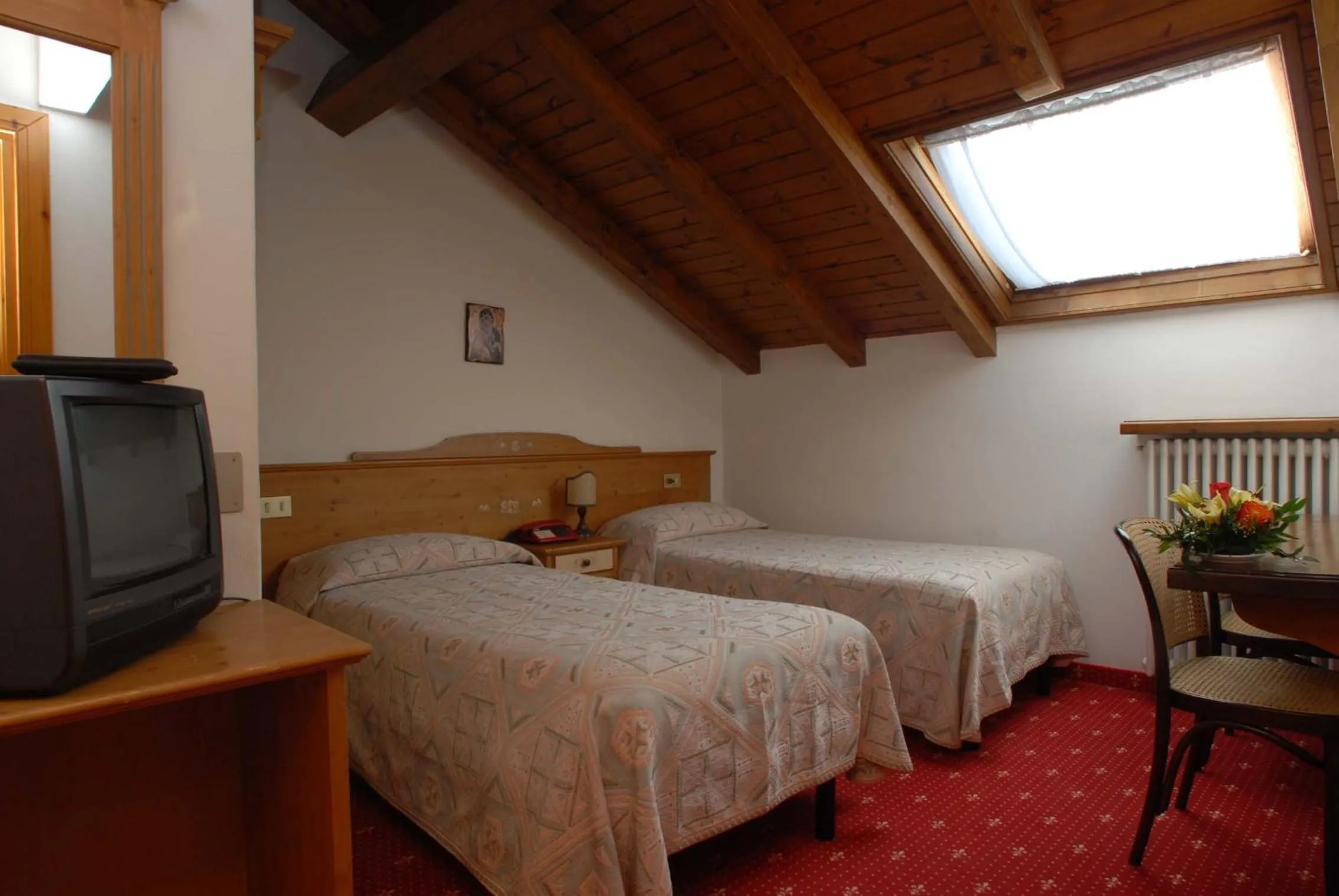 Photo of the whole room, Bed in Hotel Alpi - Foza