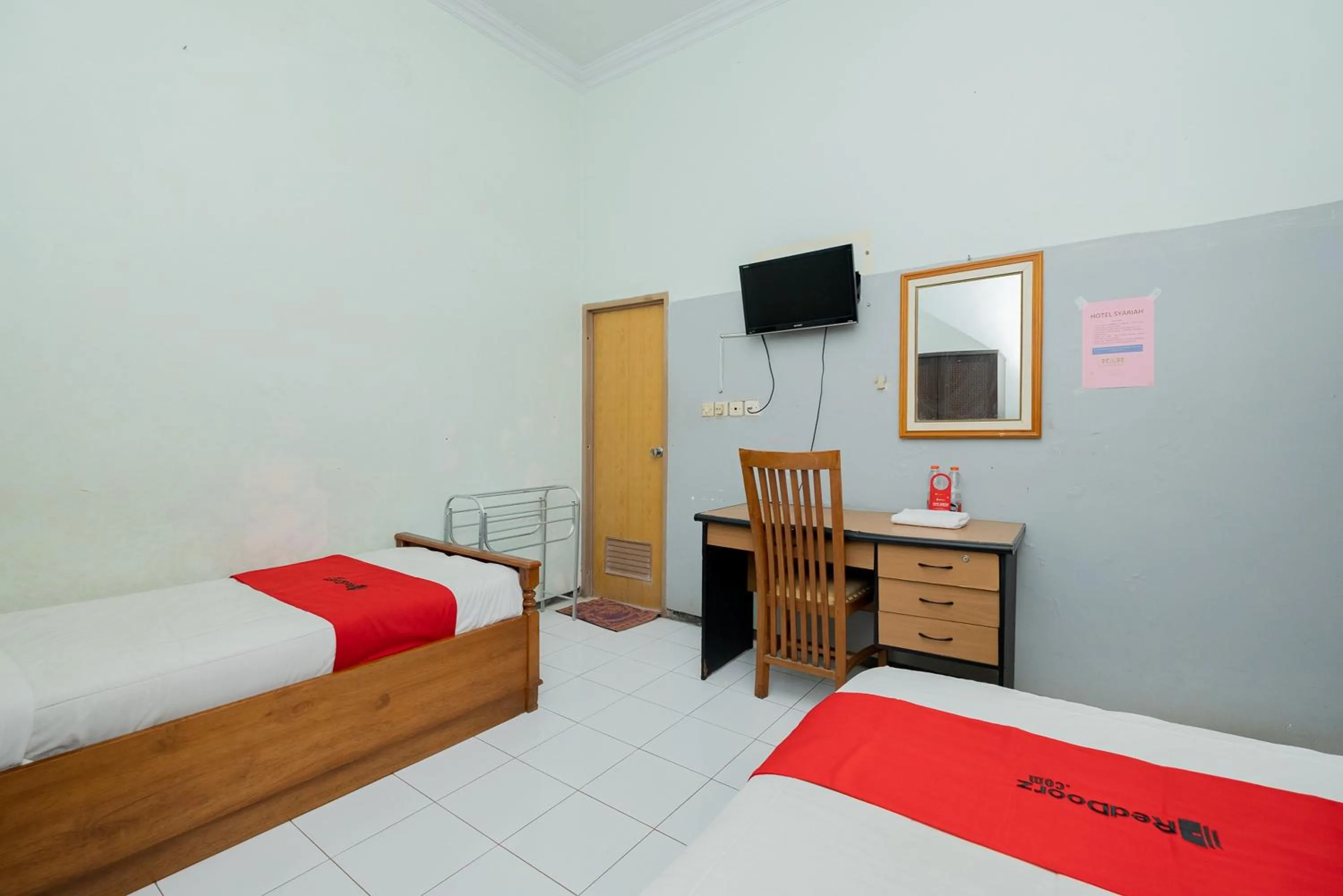 Bed in RedDoorz Syariah at Jalan Sunan Giri Tuban