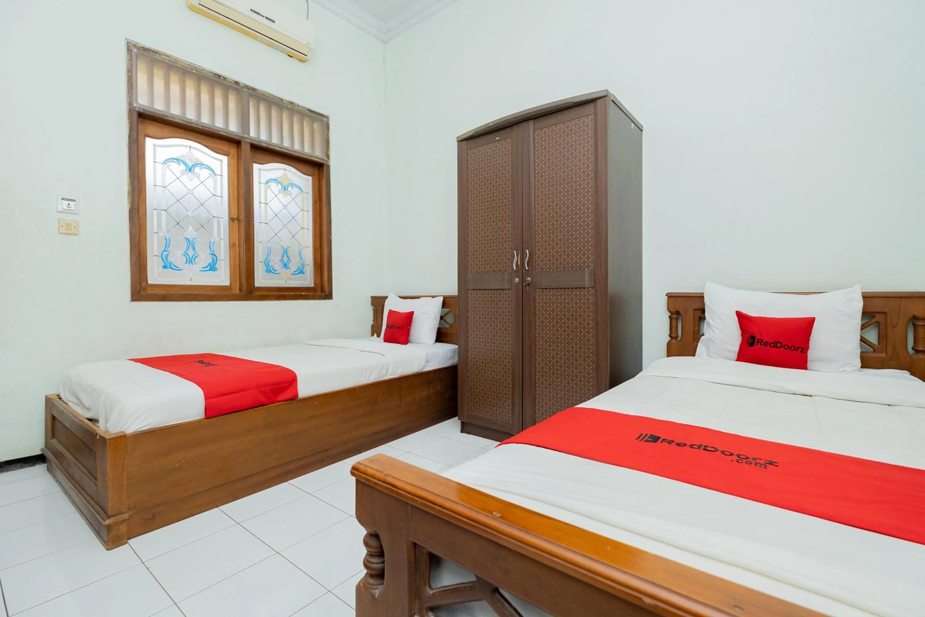 Bed in RedDoorz Syariah at Jalan Sunan Giri Tuban
