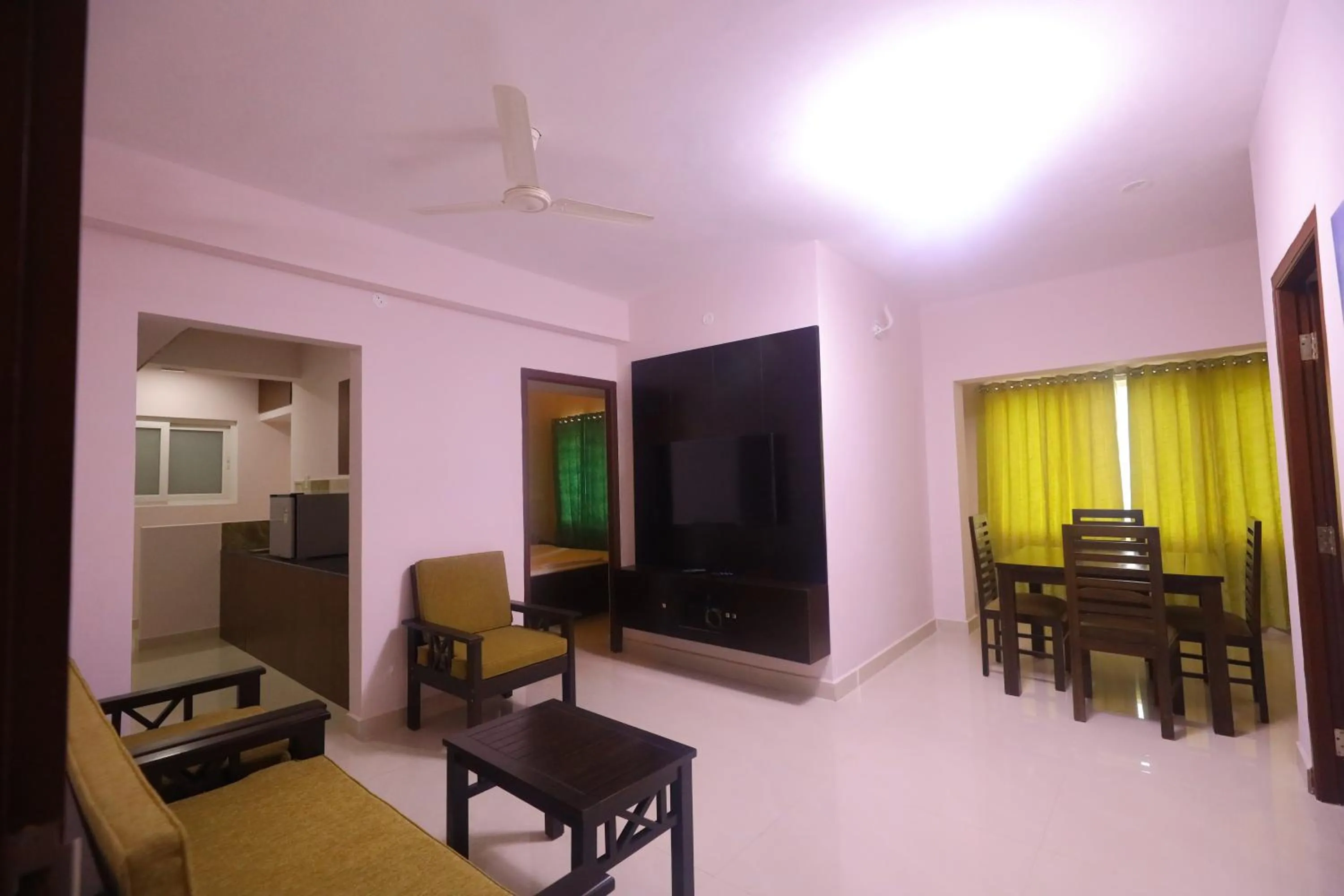 Communal lounge/ TV room in Kfour Apartment & Hotels Private Limited