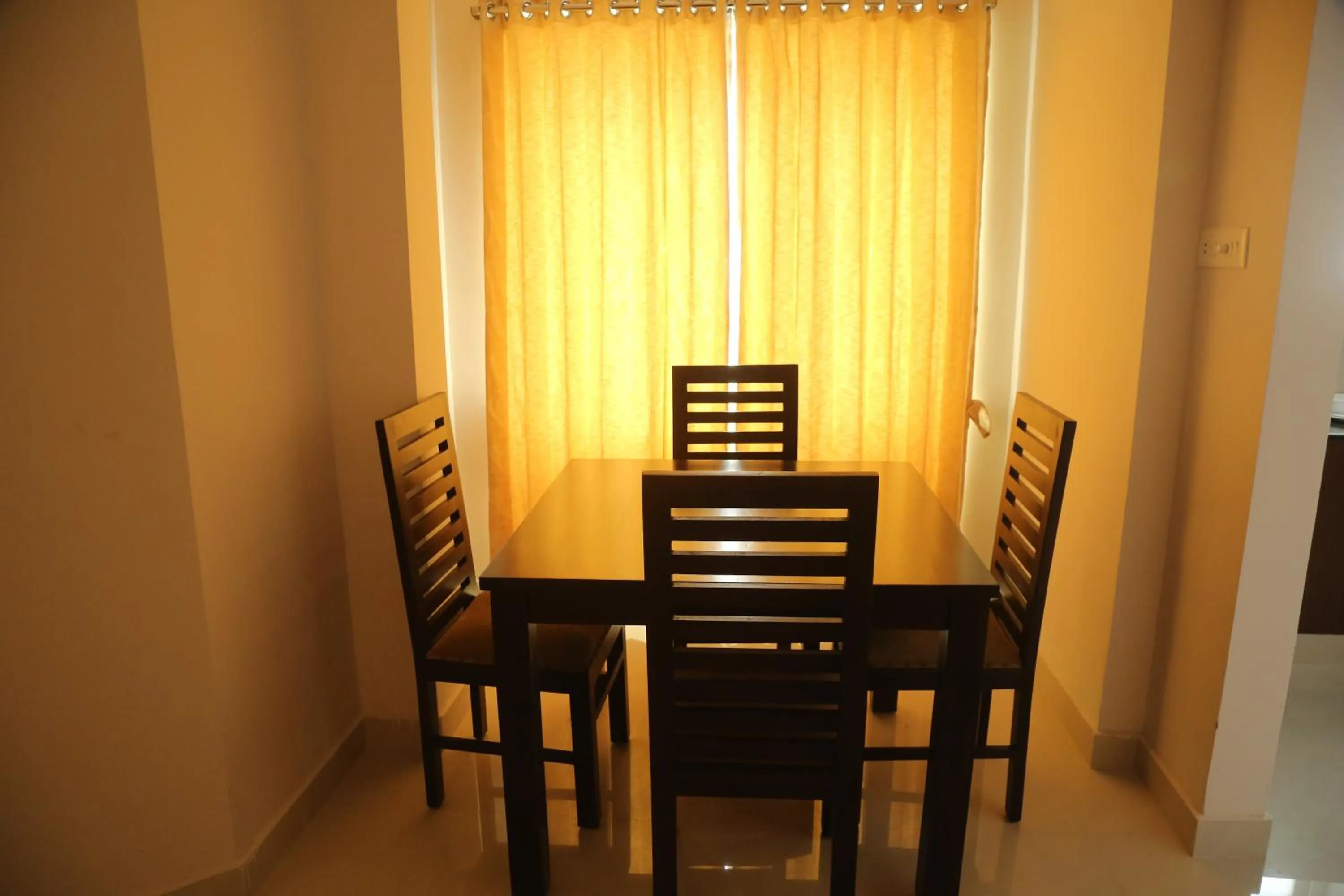 Dining area in Kfour Apartment & Hotels Private Limited