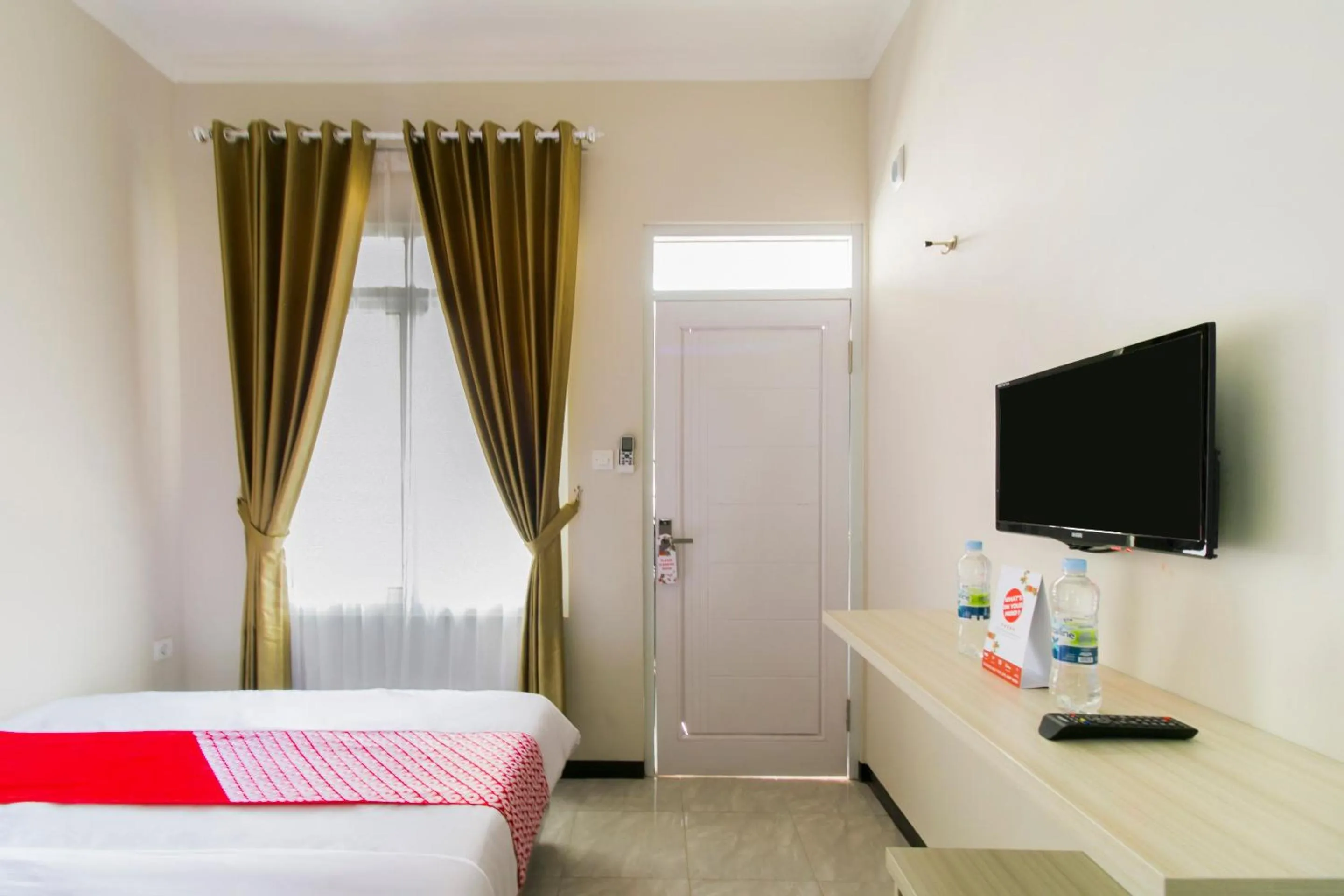 Bedroom in Hotel O Fakhira Residence