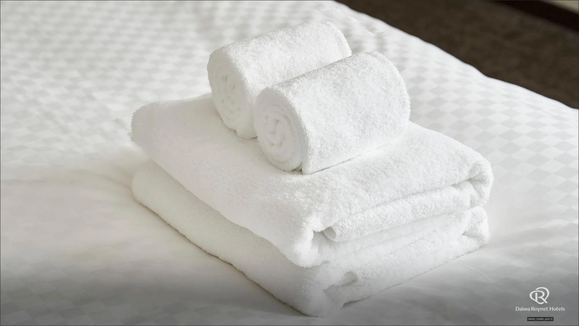 towels, Bed in Daiwa Roynet Hotel Tokyo Kyobashi PREMIER