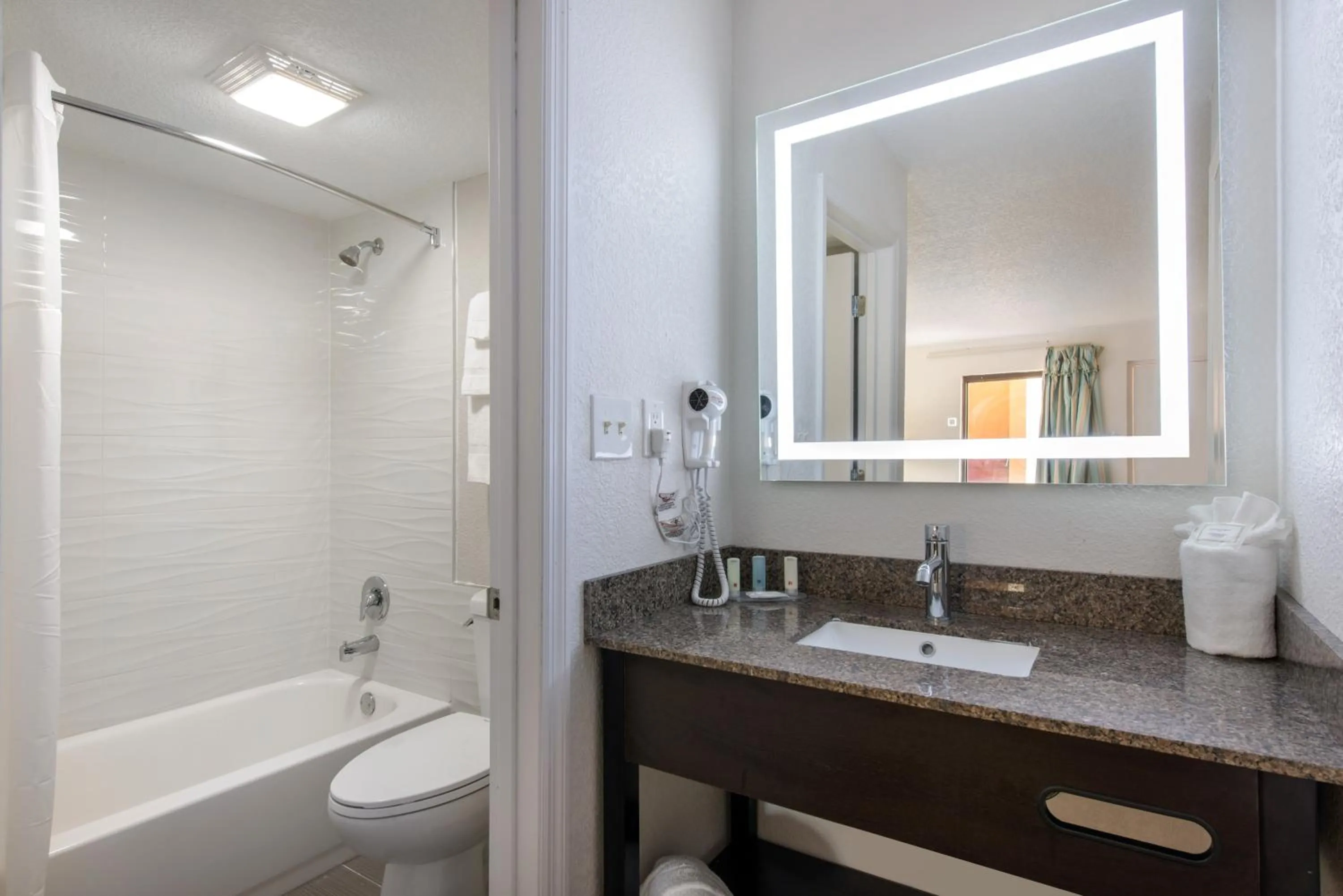 Bathroom in Clarion Inn & Suites Kissimmee-Lake Buena Vista South