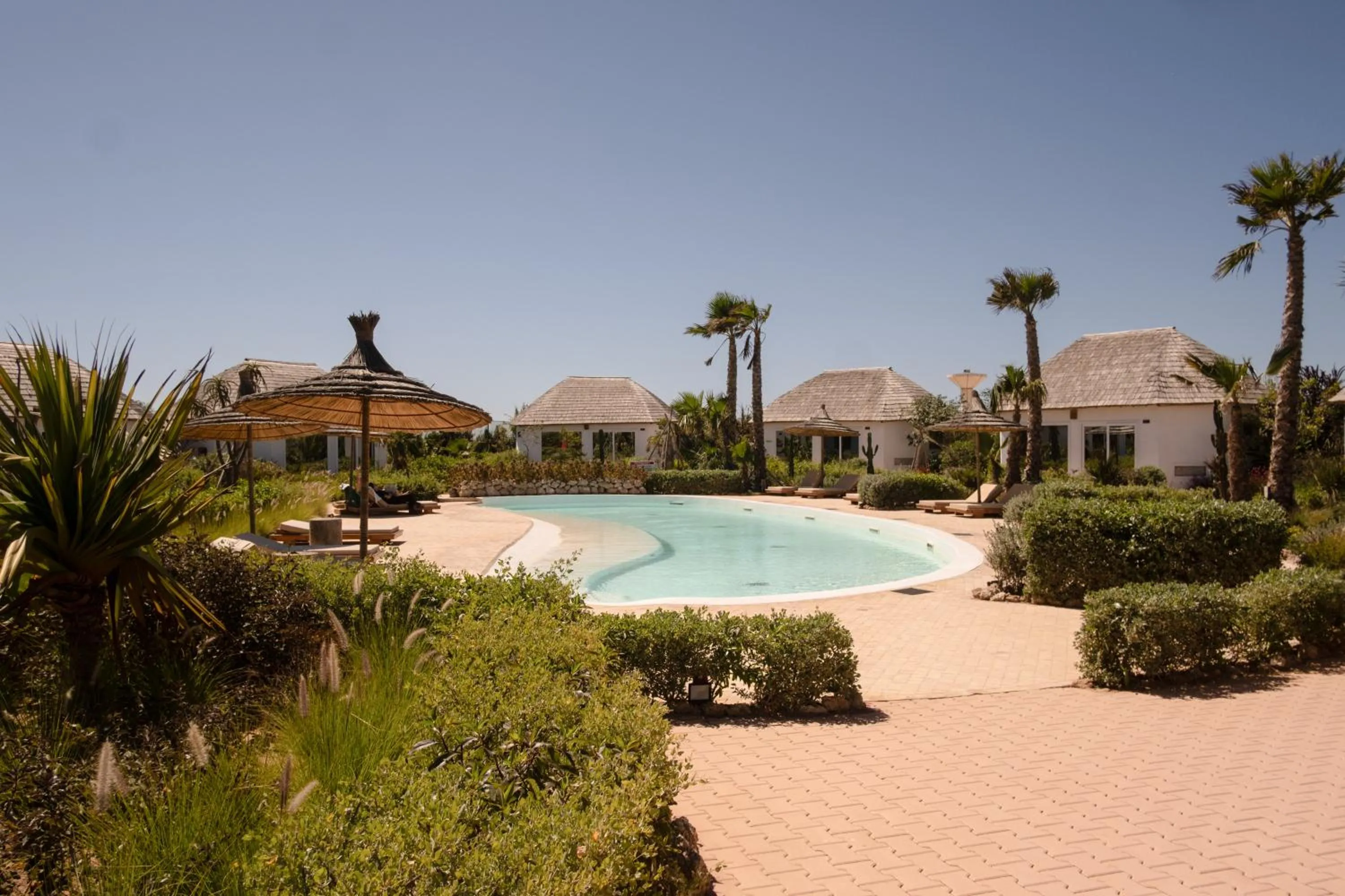 Swimming pool in La Crique Nature & Spa
