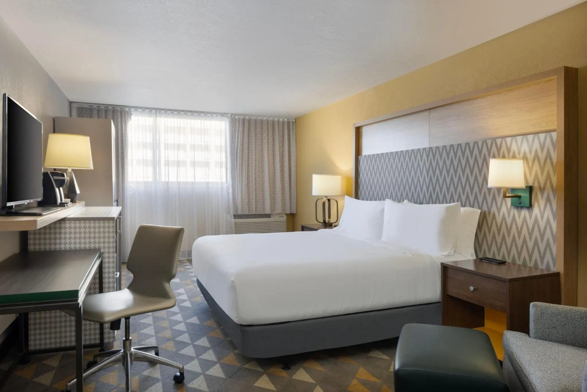 Photo of the whole room, Bed in Holiday Inn & Suites Orlando SW - Celebration Area by IHG