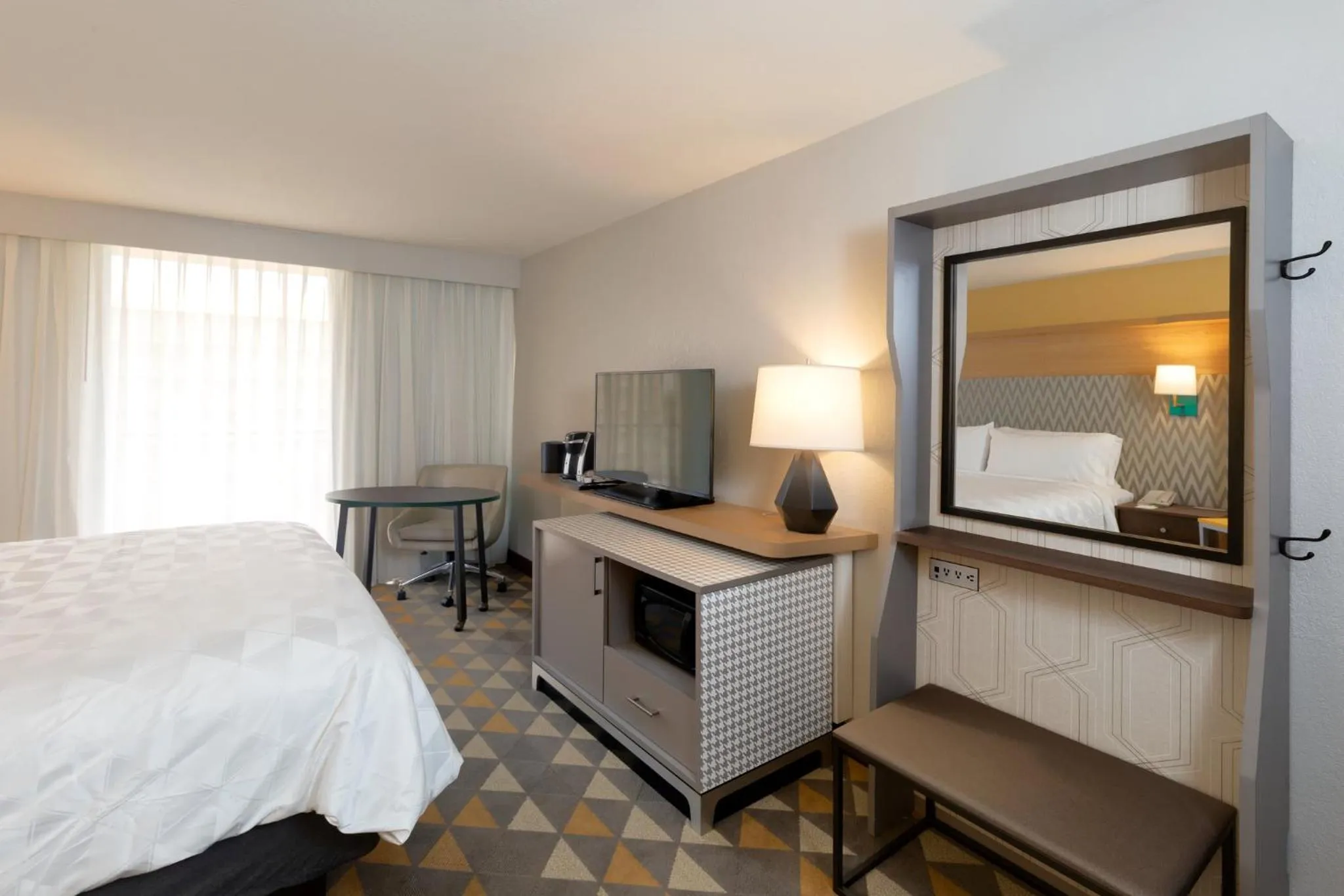 Photo of the whole room, Bed in Holiday Inn & Suites Orlando SW - Celebration Area by IHG