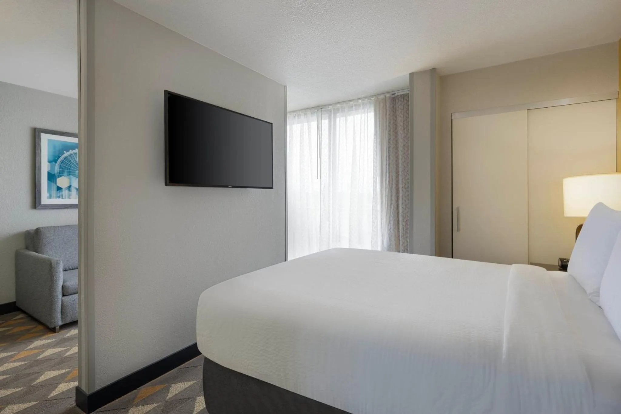 Photo of the whole room, Bed in Holiday Inn & Suites Orlando SW - Celebration Area by IHG