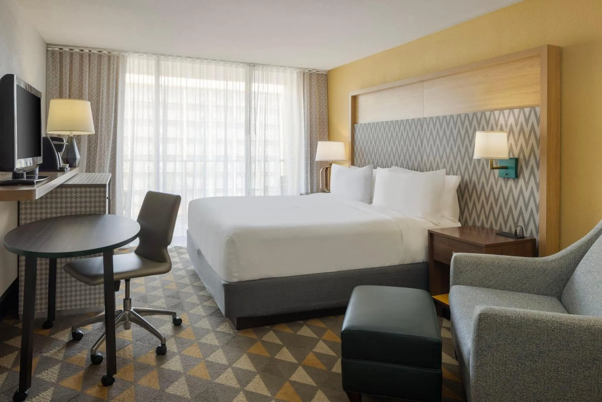 Photo of the whole room, Bed in Holiday Inn & Suites Orlando SW - Celebration Area by IHG