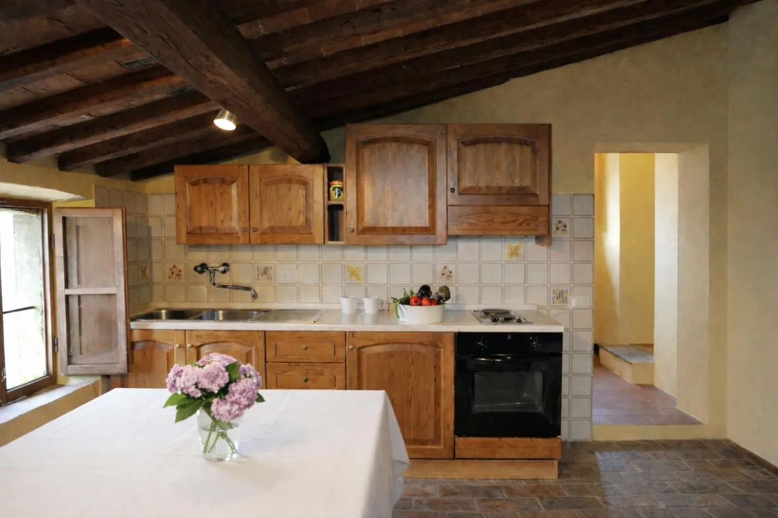 Kitchen or kitchenette in Fattoria Agriturismo Nerbona