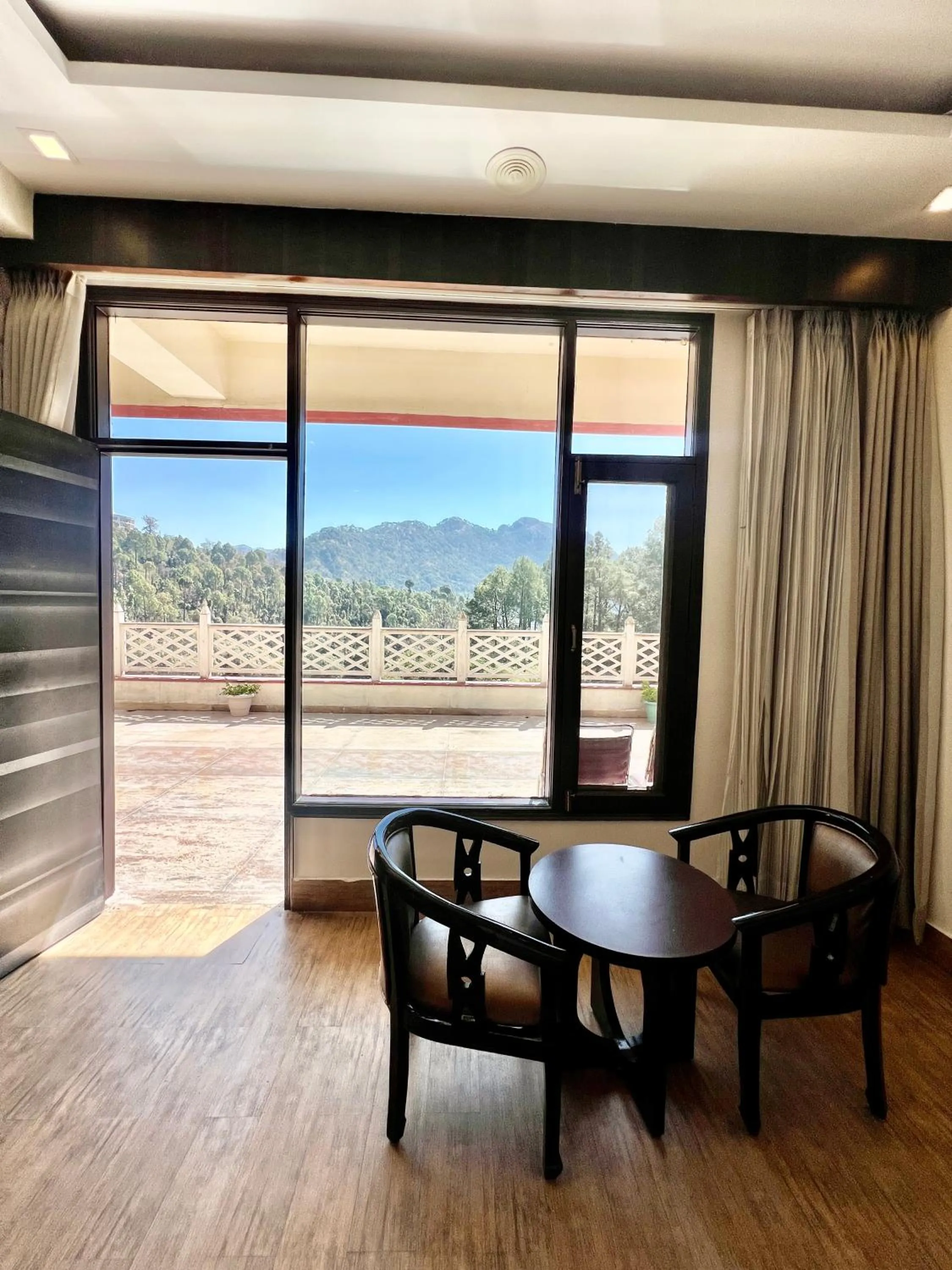 Balcony/Terrace in Sea Hawk - Luxury Hill Resort 4 mins from Bhimtal Lake