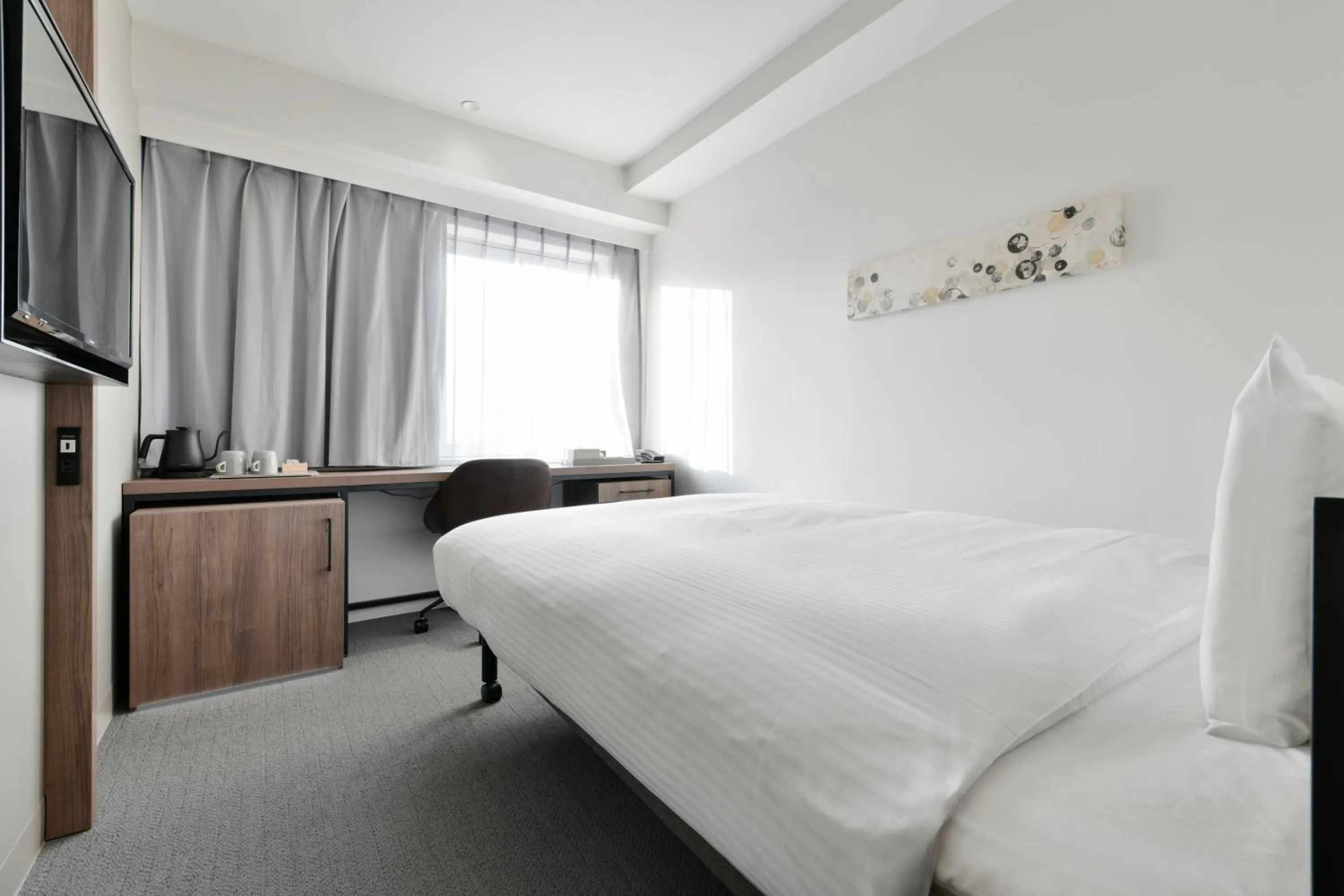 Bed in Vessel Inn Keisei Tsudanuma Station