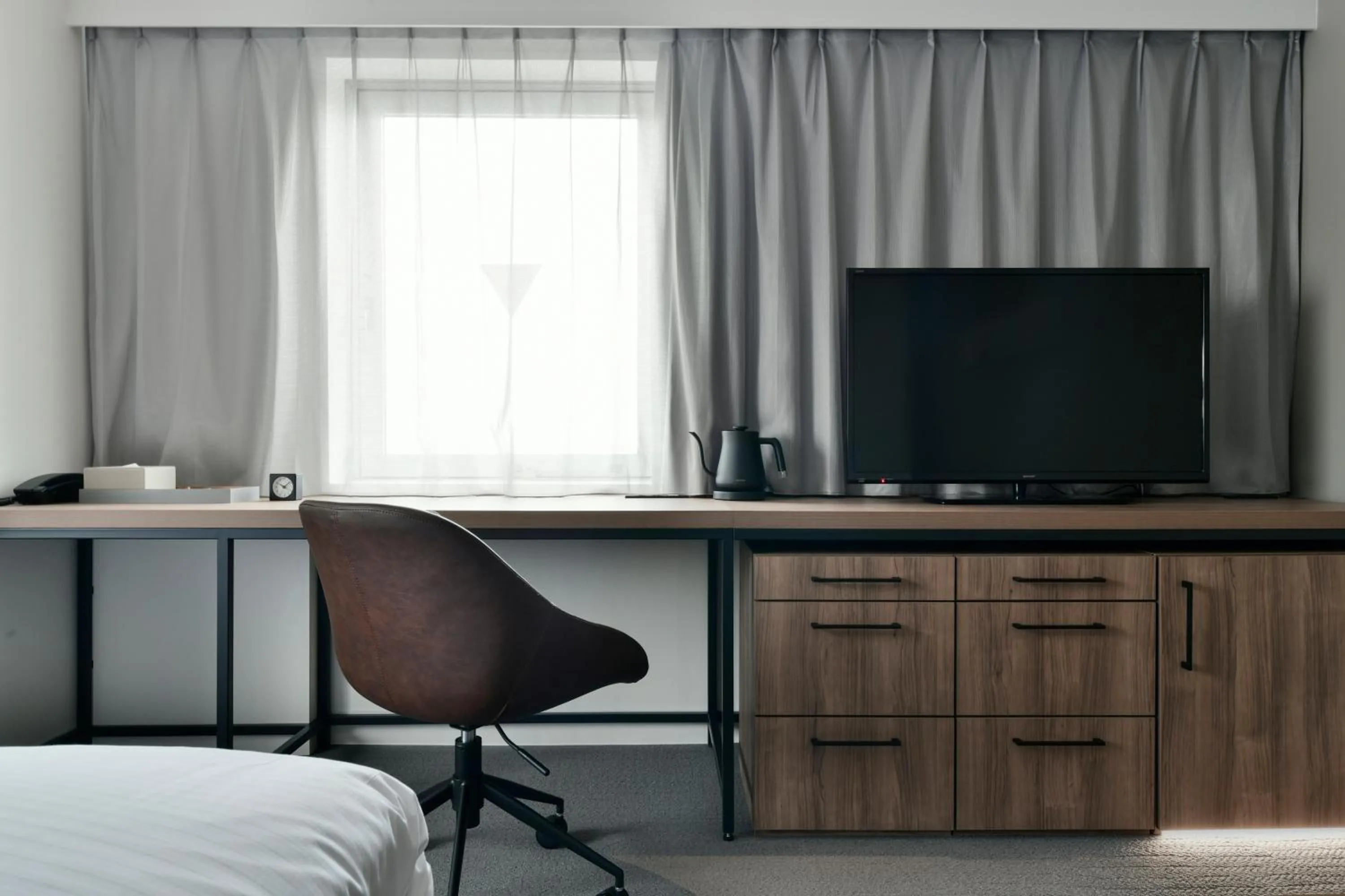 Bed in Vessel Inn Keisei Tsudanuma Station