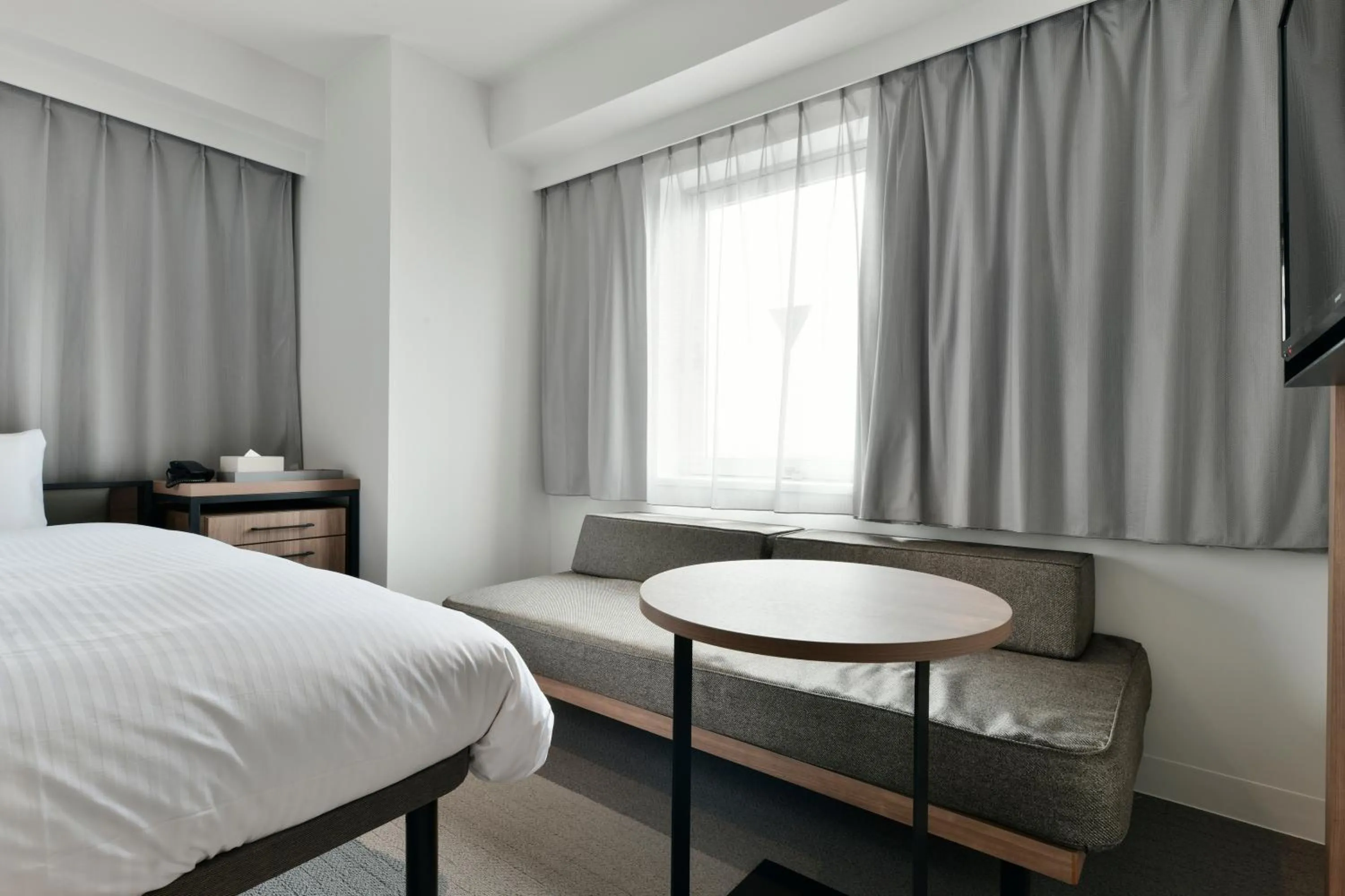 Bed in Vessel Inn Keisei Tsudanuma Station