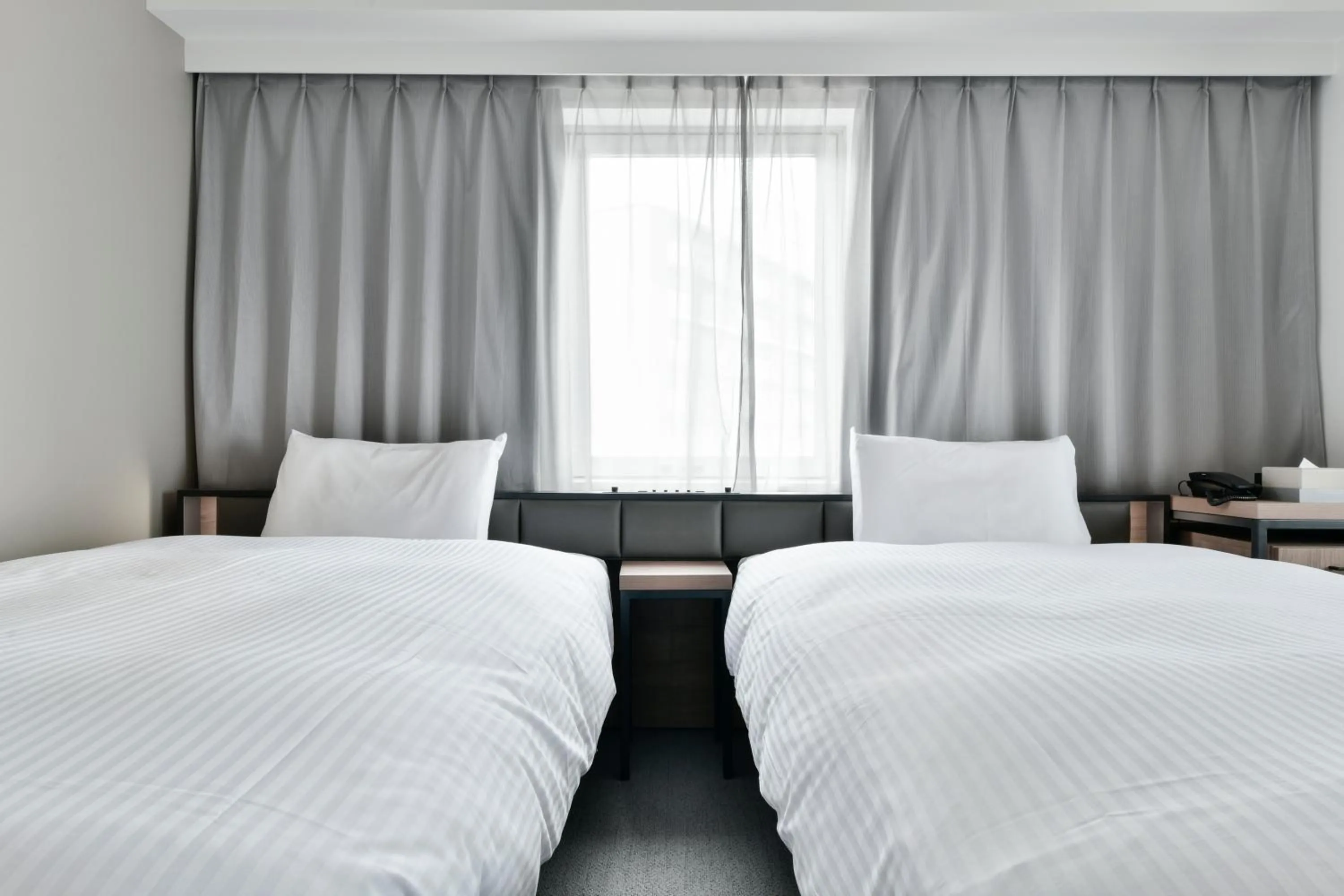 Bed in Vessel Inn Keisei Tsudanuma Station