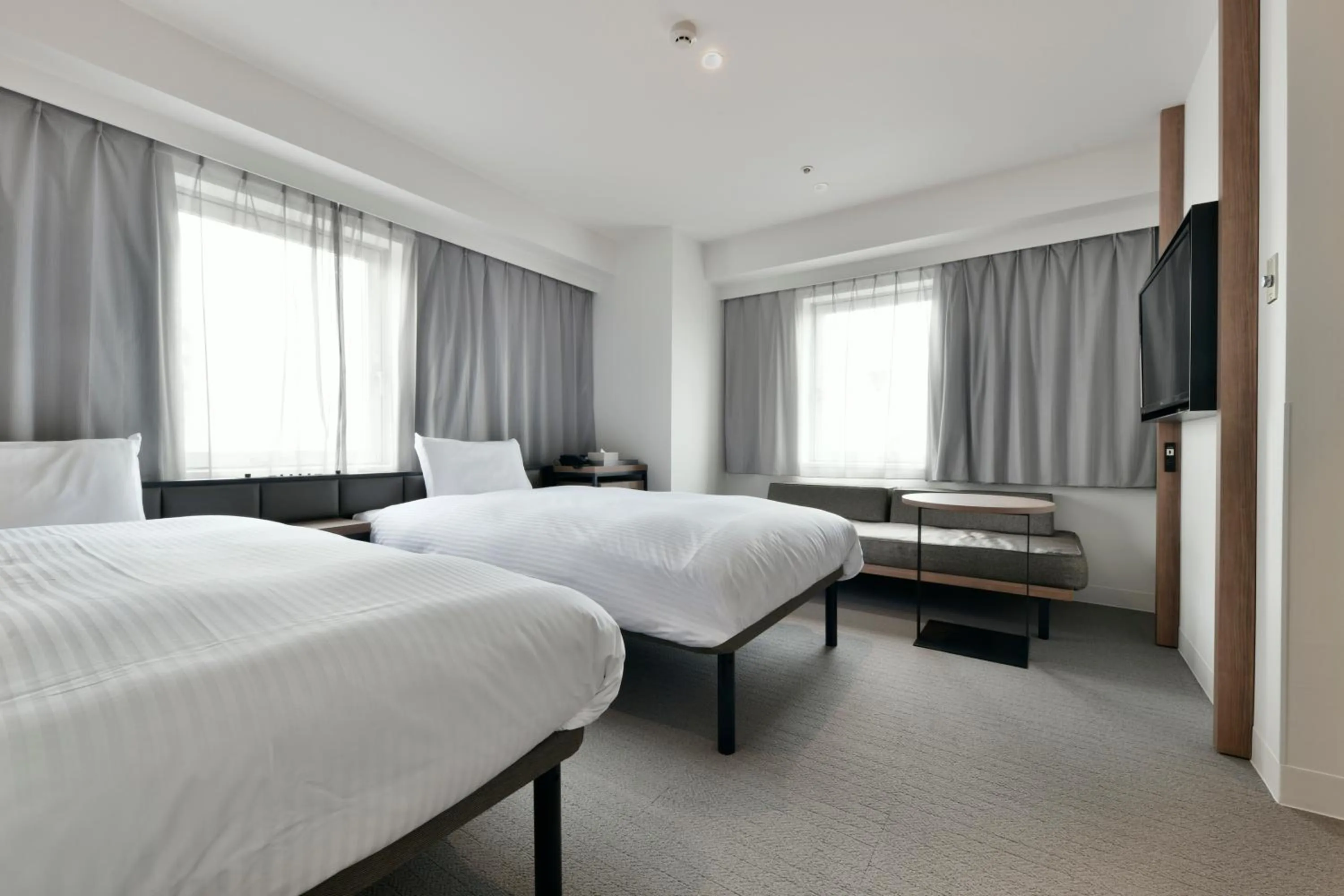 Bed in Vessel Inn Keisei Tsudanuma Station