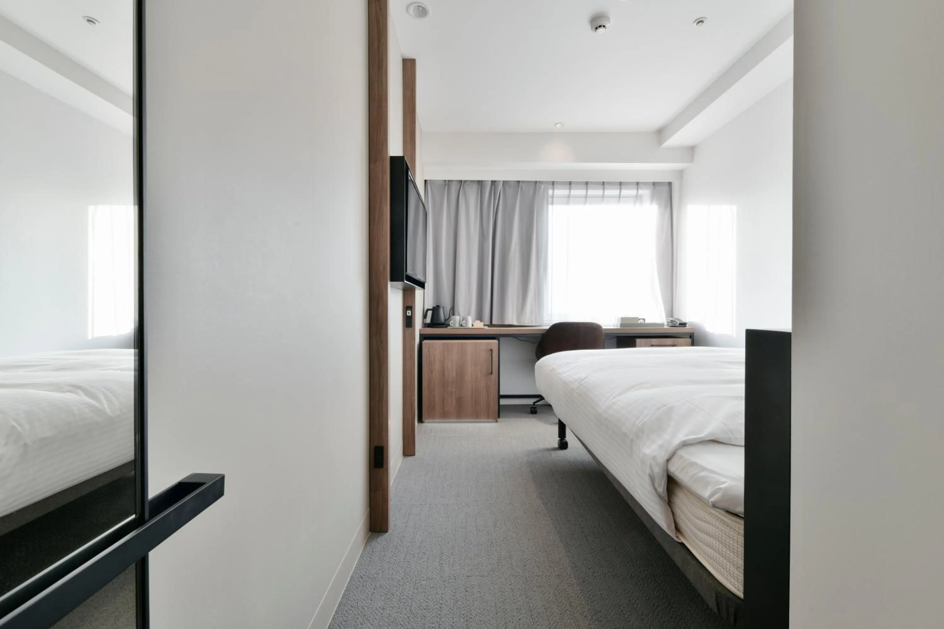 Bed in Vessel Inn Keisei Tsudanuma Station