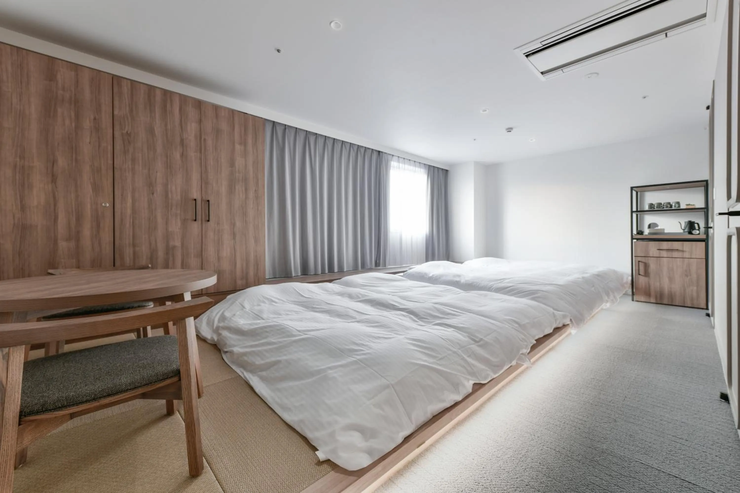 Bed in Vessel Inn Keisei Tsudanuma Station