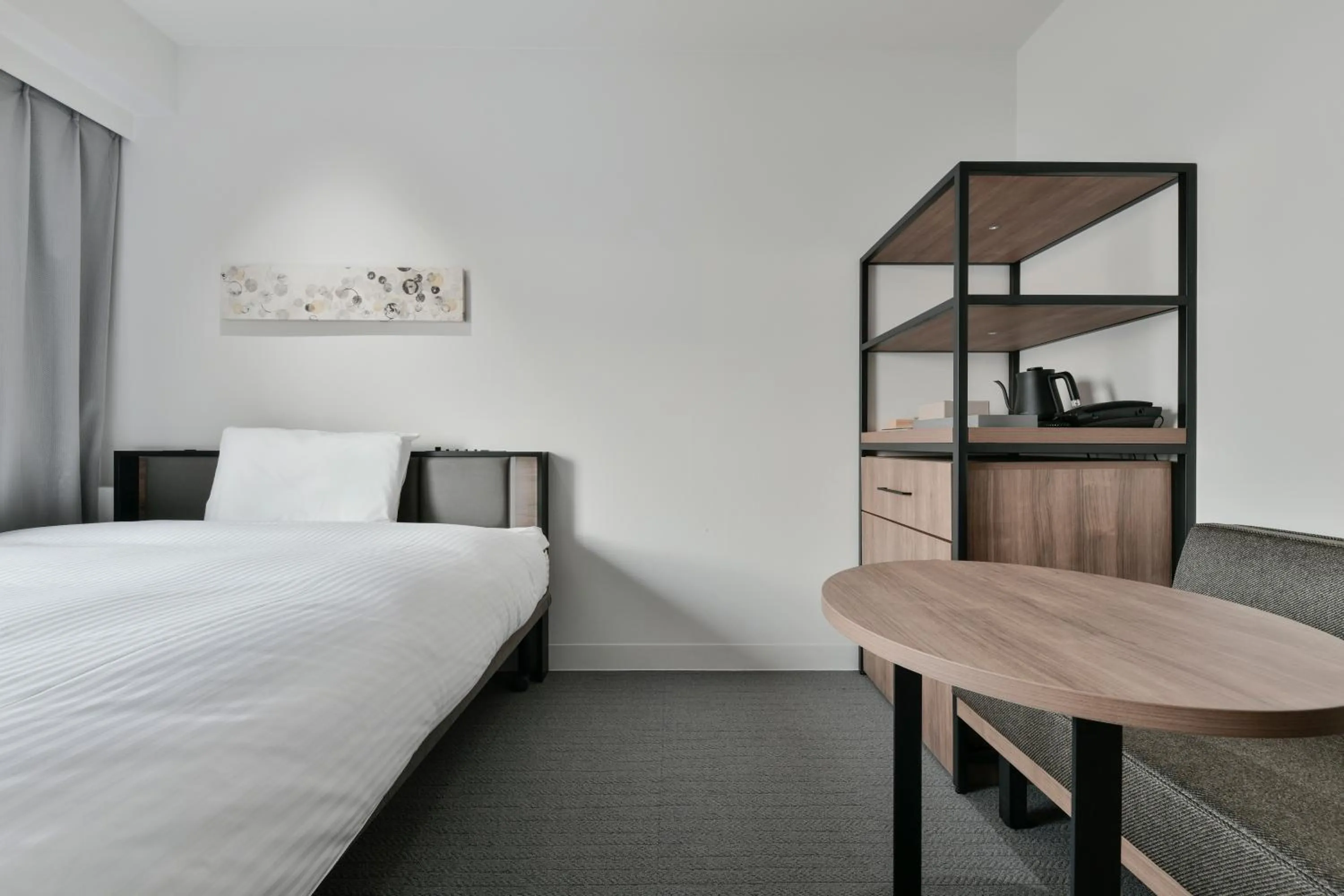 Bed in Vessel Inn Keisei Tsudanuma Station