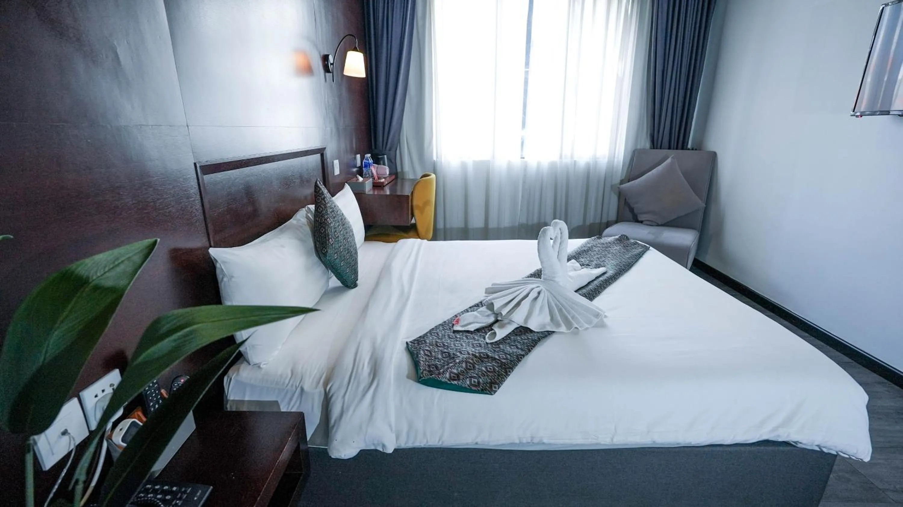 Bed in East Riverine Boutique Hotel