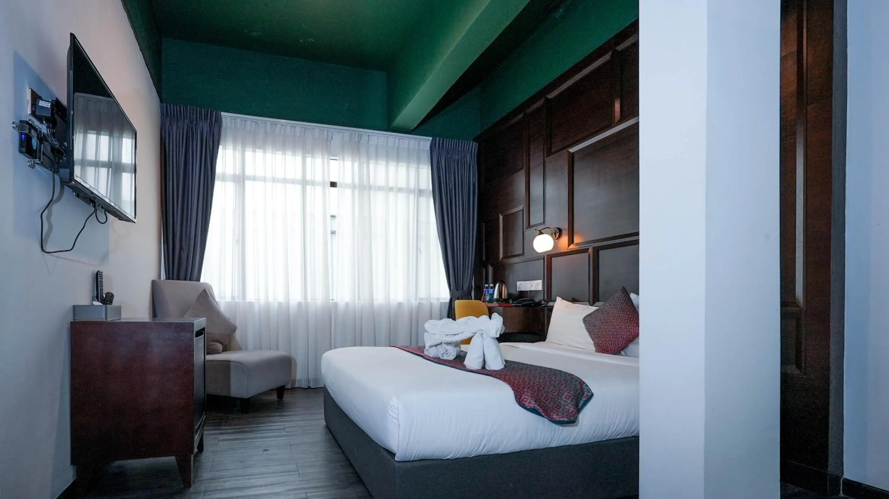 Bed in East Riverine Boutique Hotel