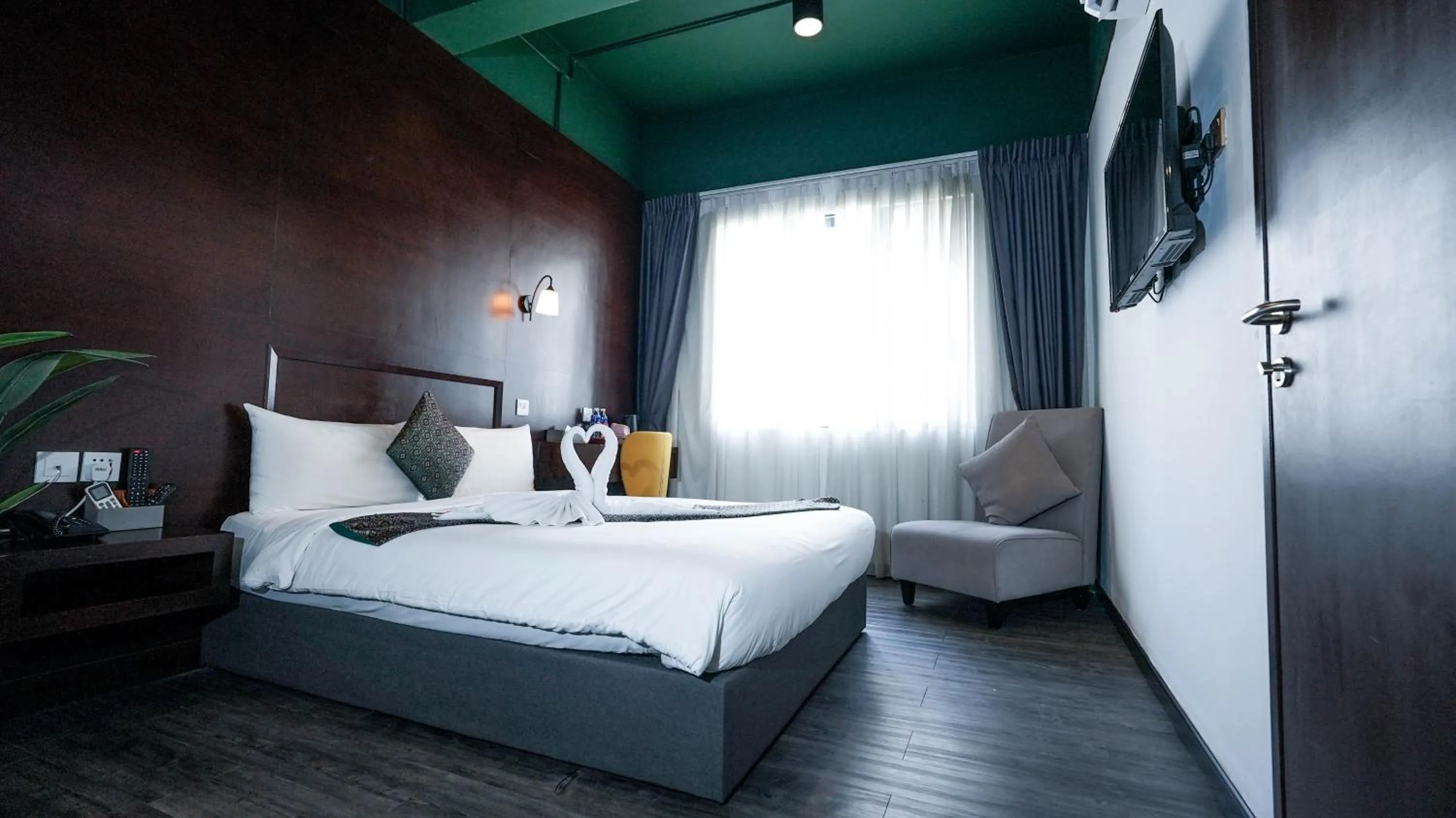 Bed in East Riverine Boutique Hotel