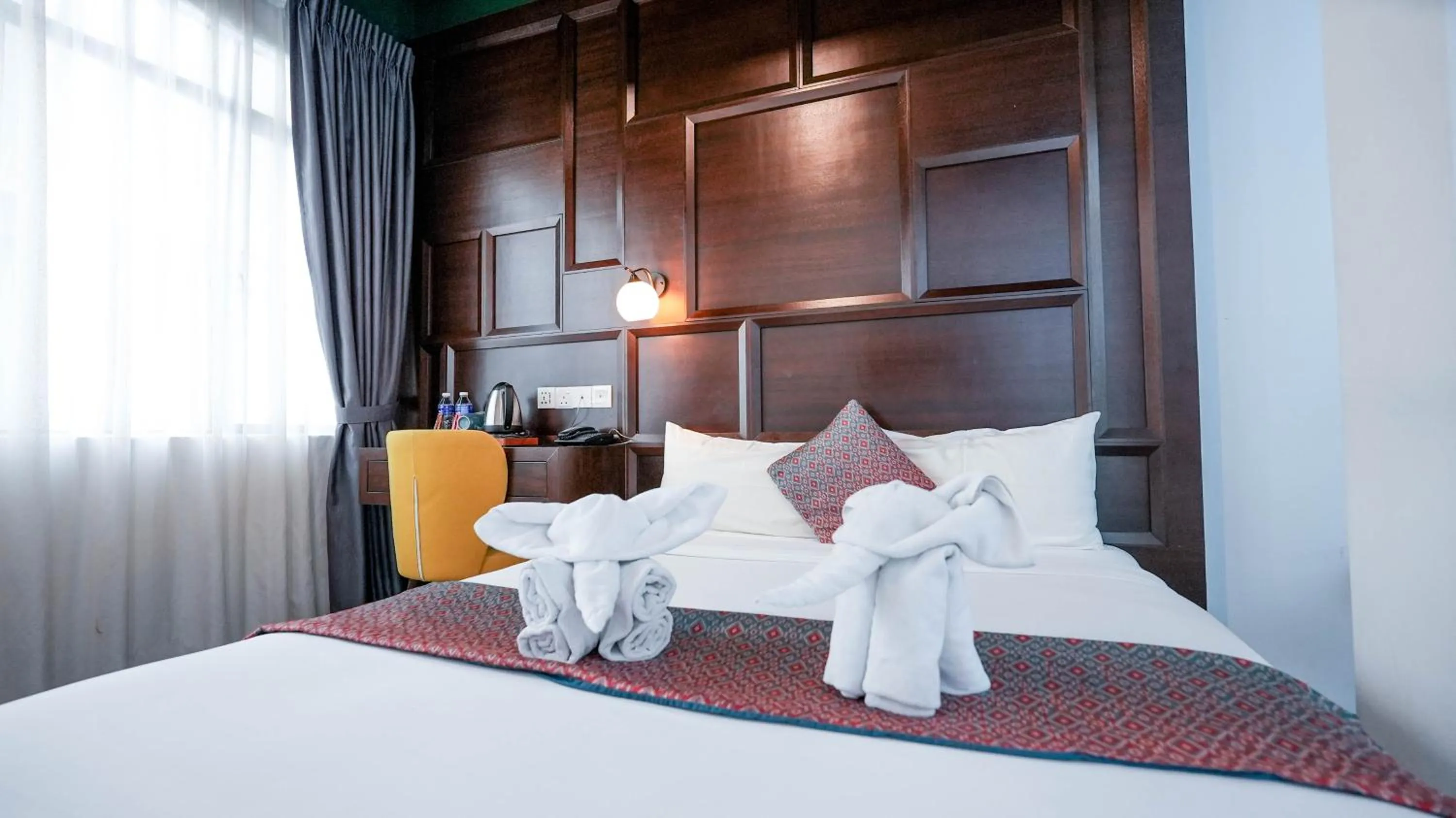 Bed in East Riverine Boutique Hotel