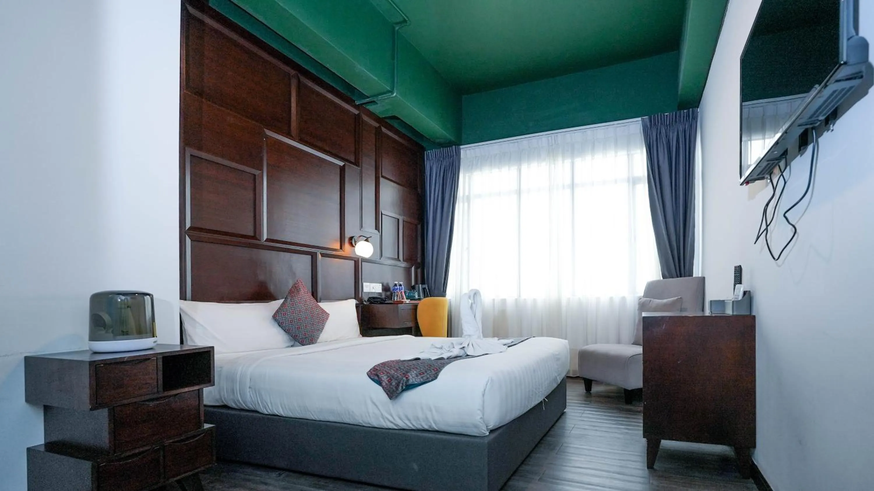 Bed in East Riverine Boutique Hotel