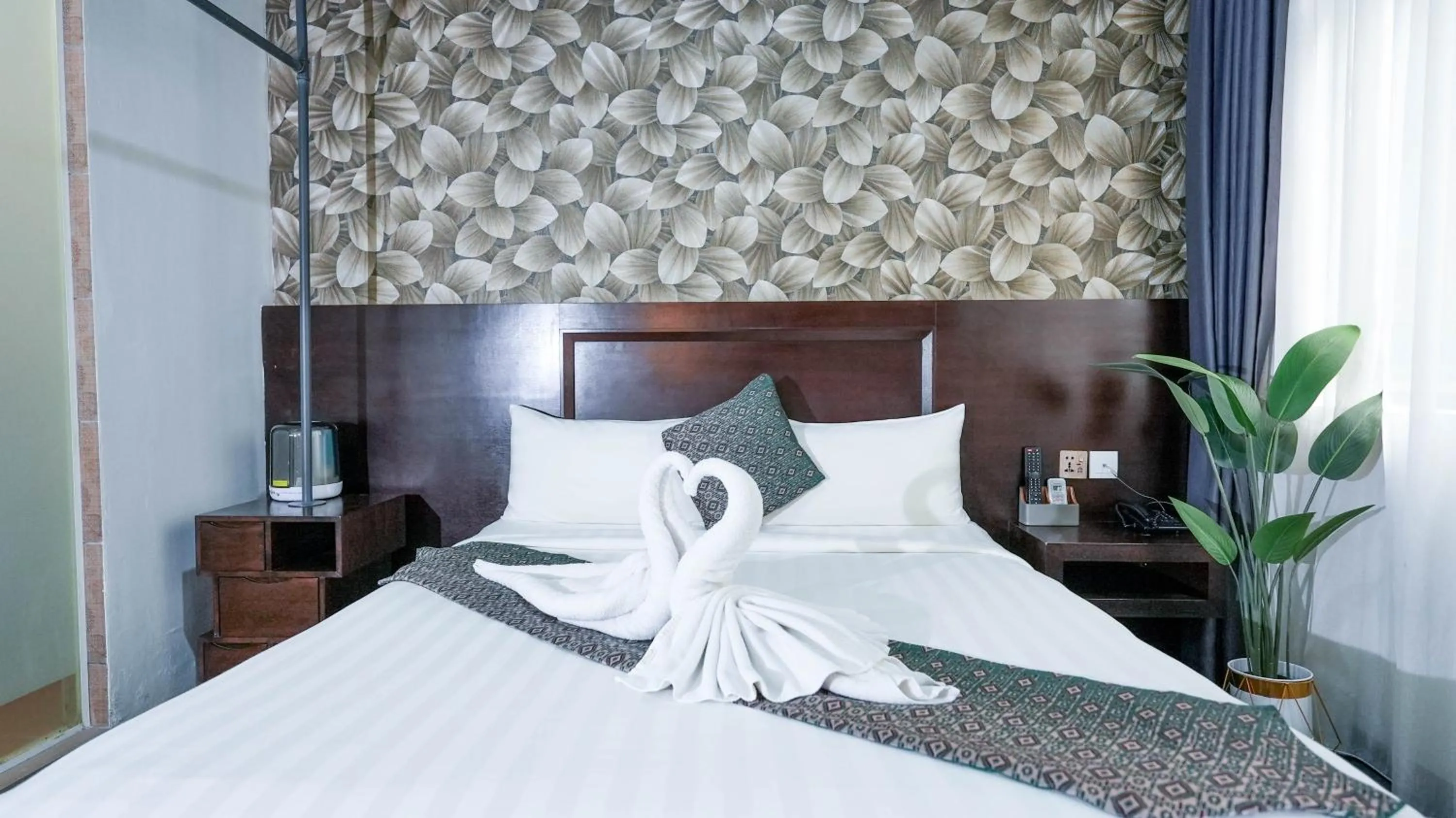 Bed in East Riverine Boutique Hotel