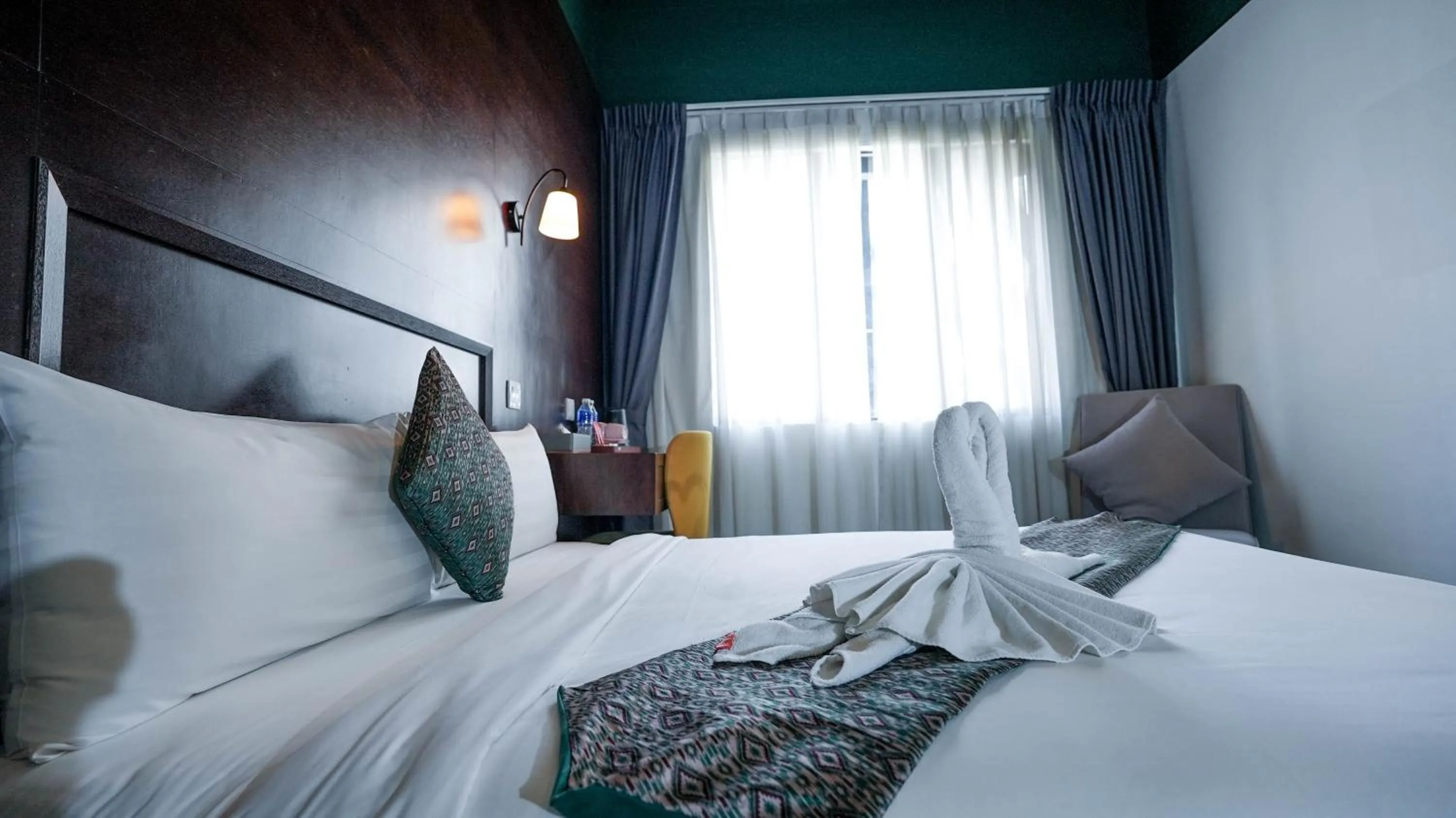 Bed in East Riverine Boutique Hotel