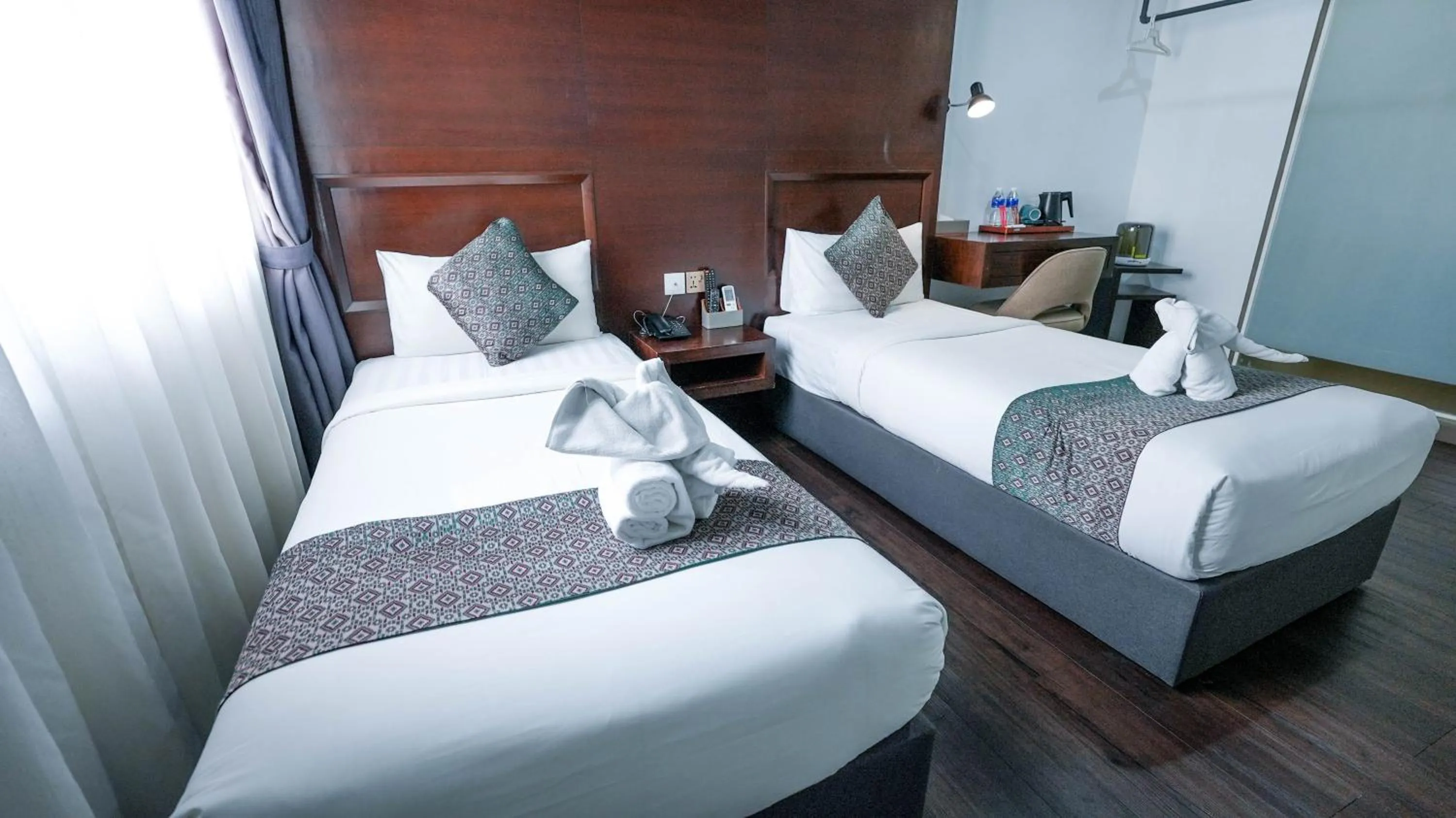 Bed in East Riverine Boutique Hotel