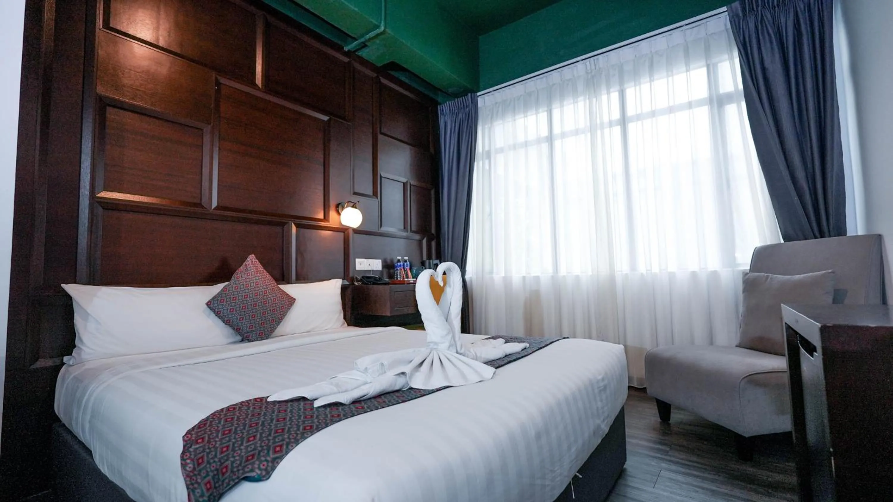 Seating area, Bed in East Riverine Boutique Hotel