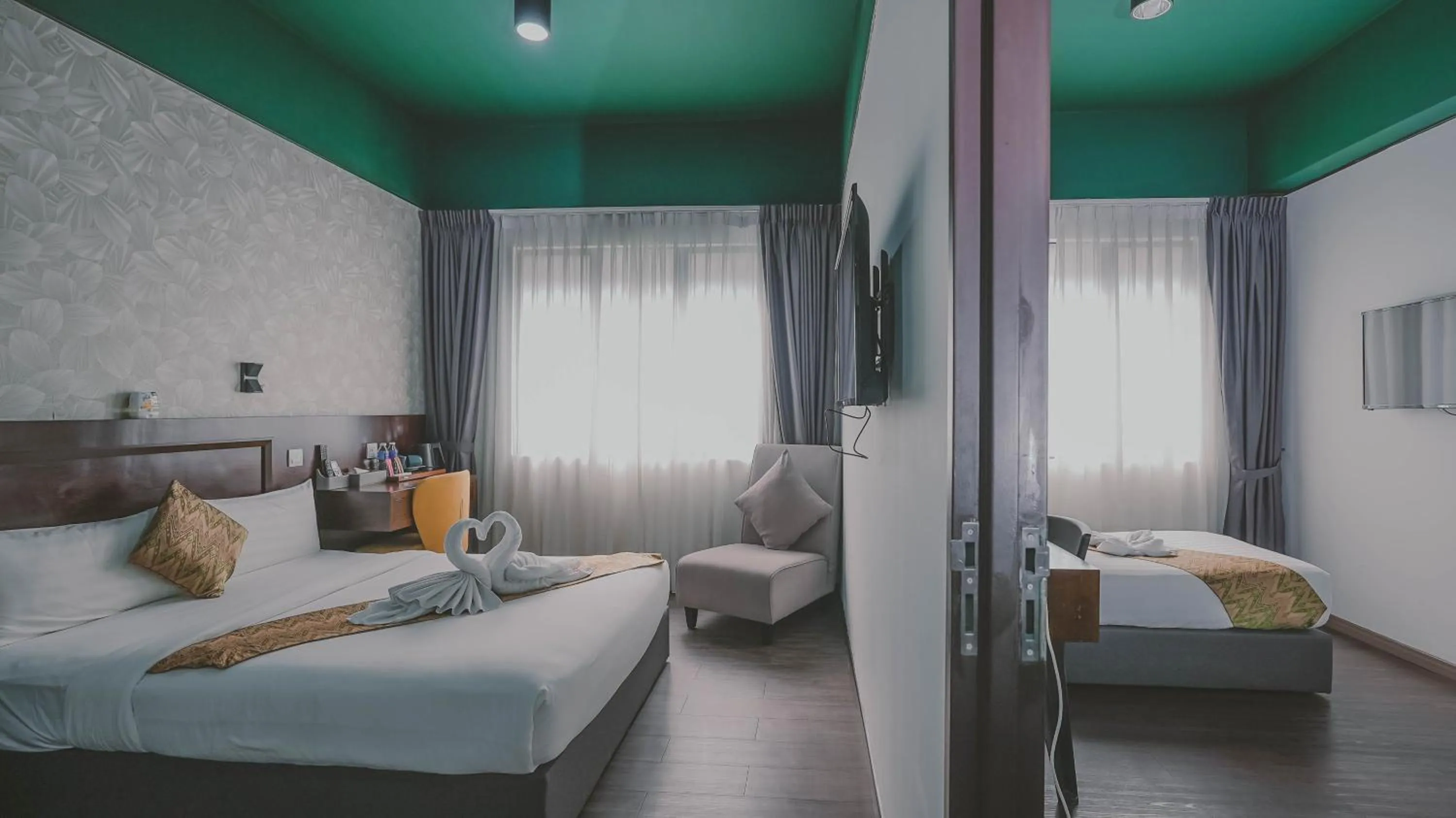 Bed in East Riverine Boutique Hotel