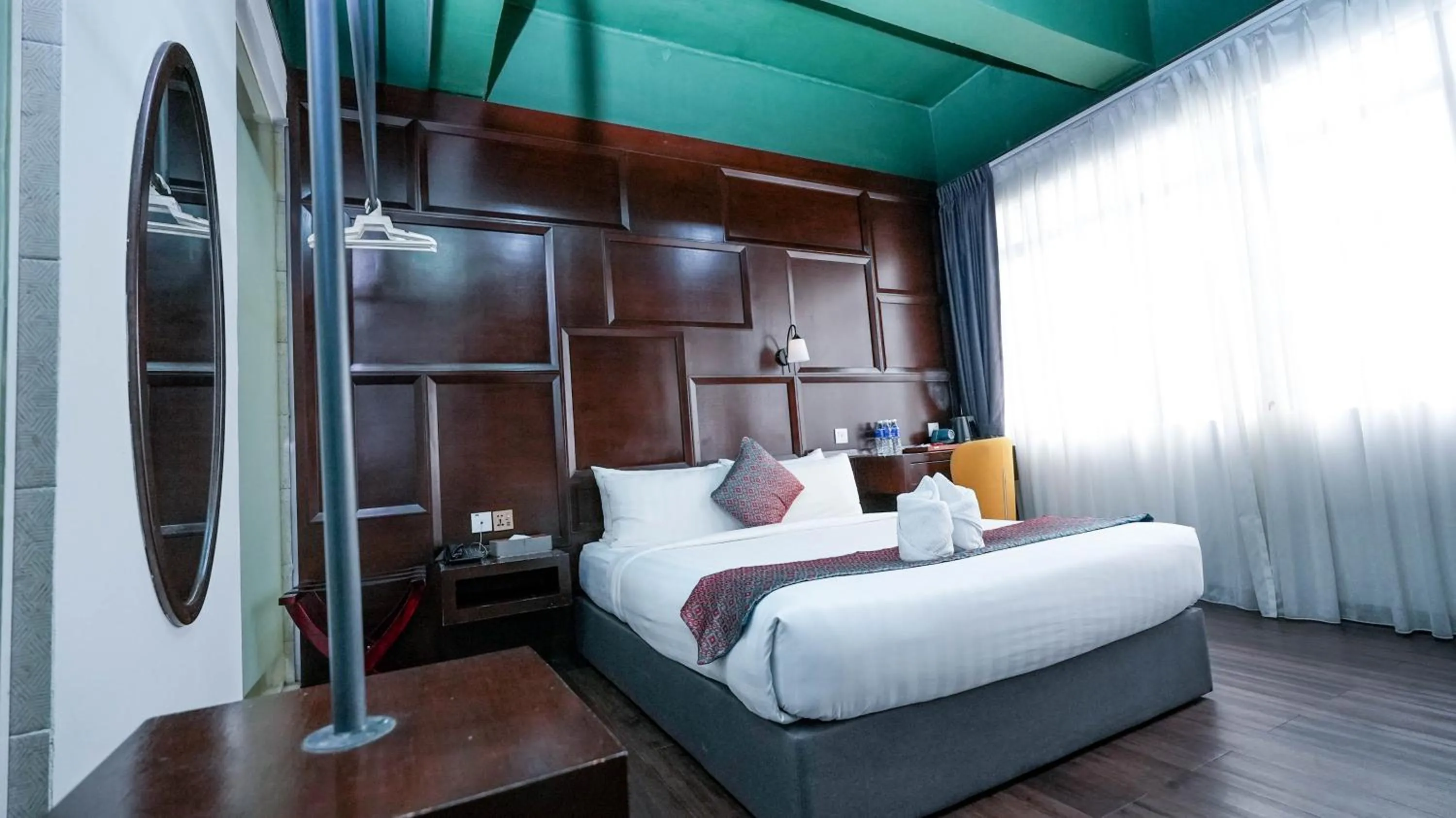 Bed in East Riverine Boutique Hotel