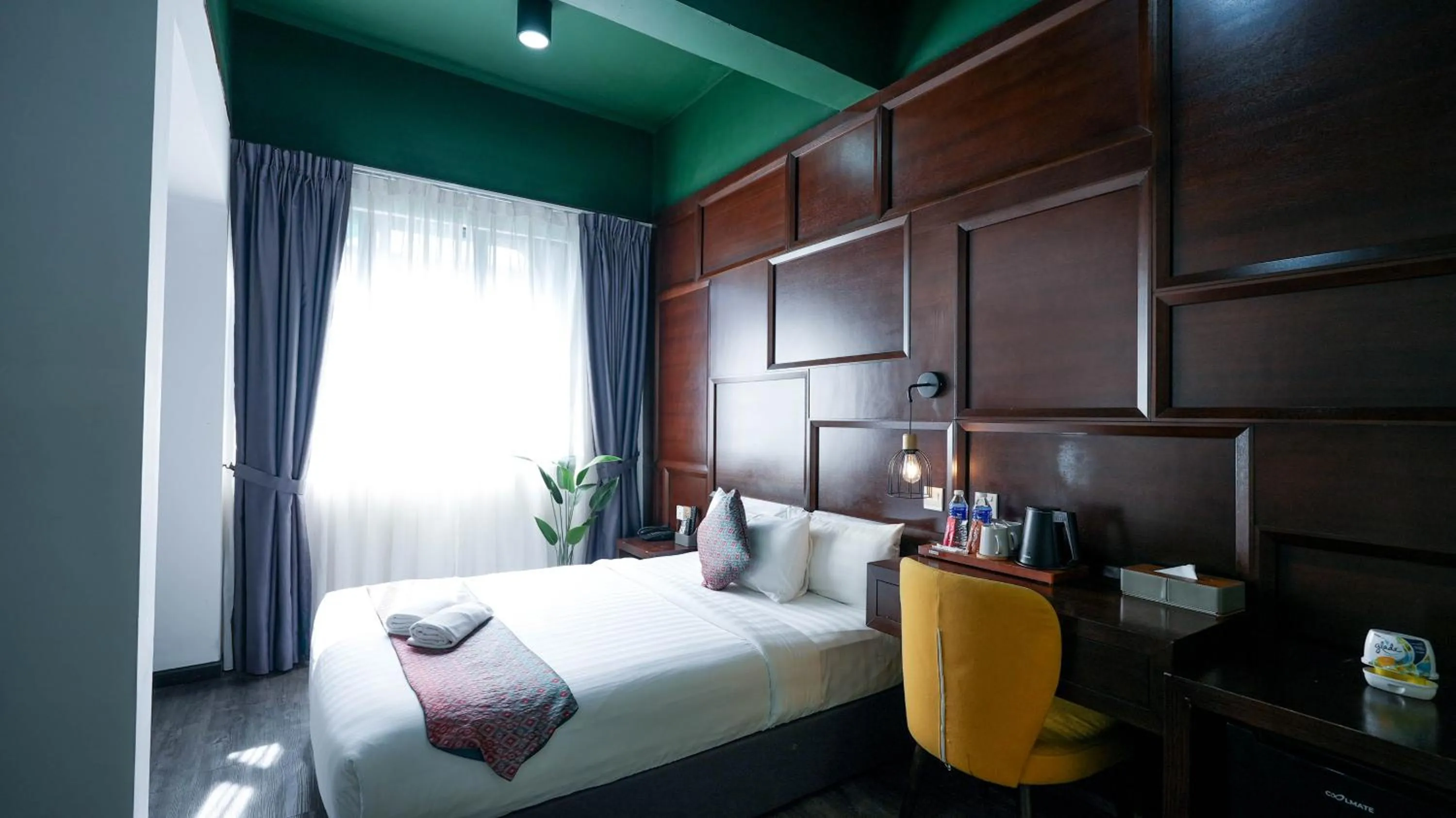 Bed in East Riverine Boutique Hotel