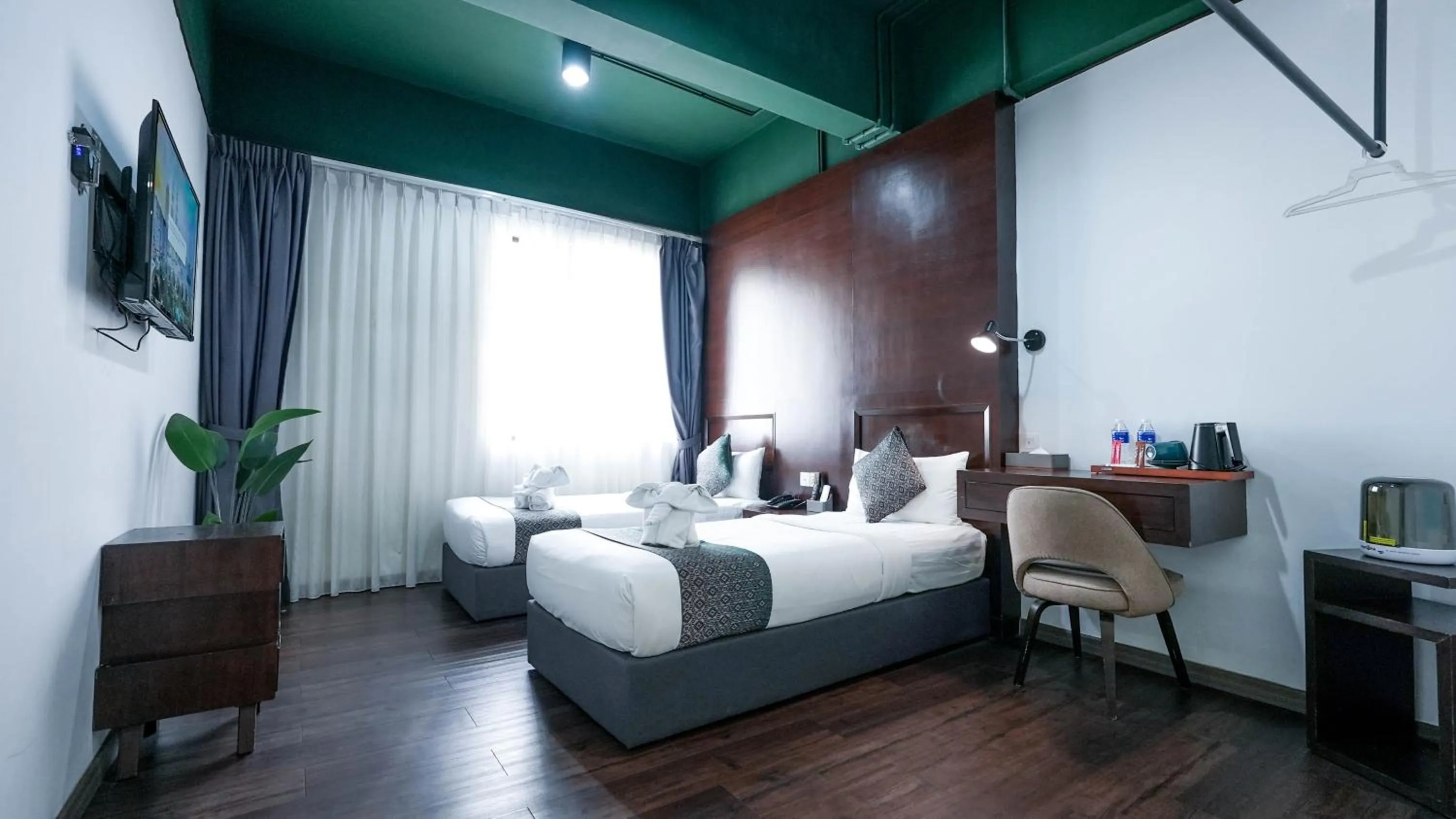 Bed in East Riverine Boutique Hotel