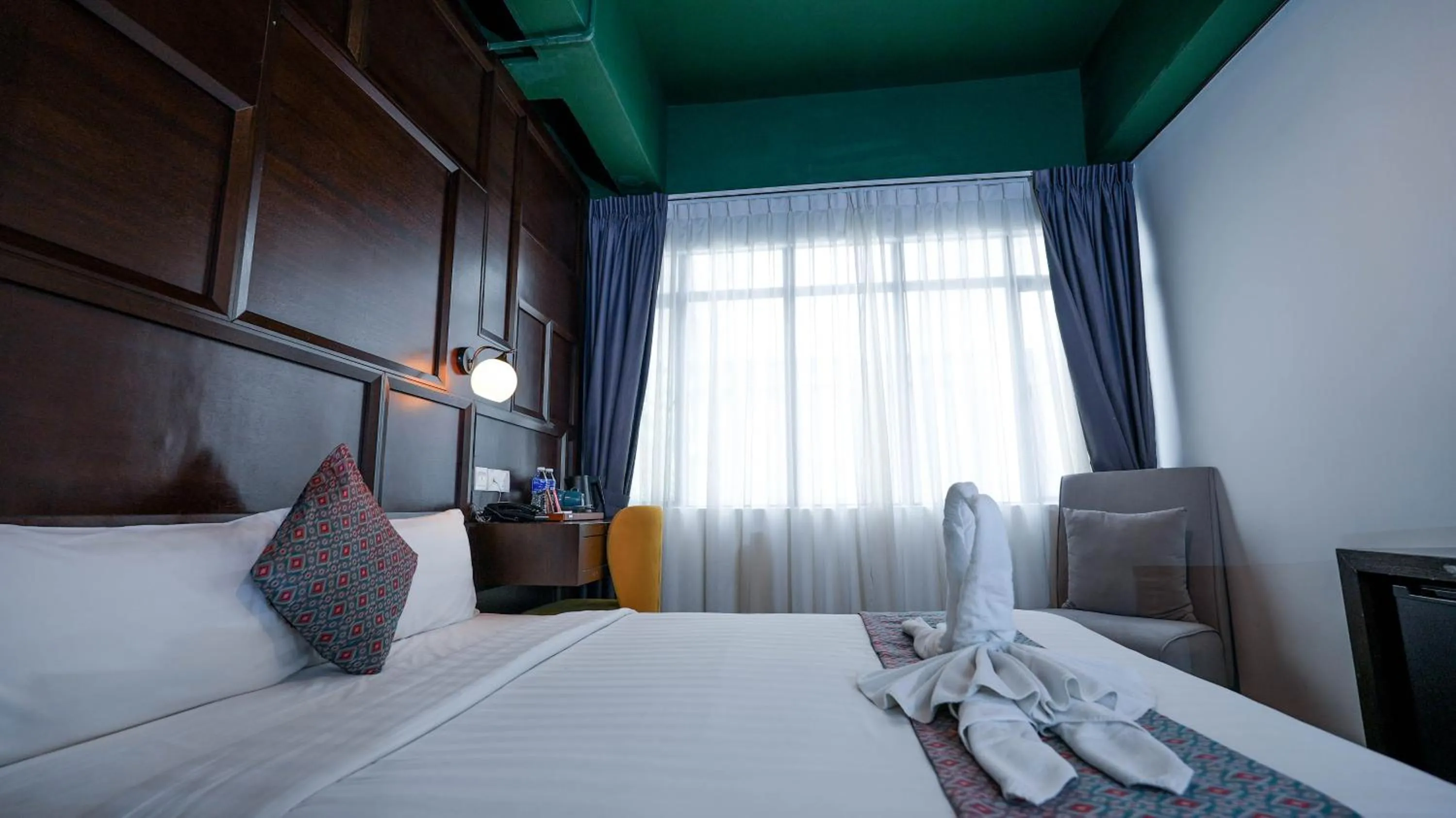 Bed in East Riverine Boutique Hotel