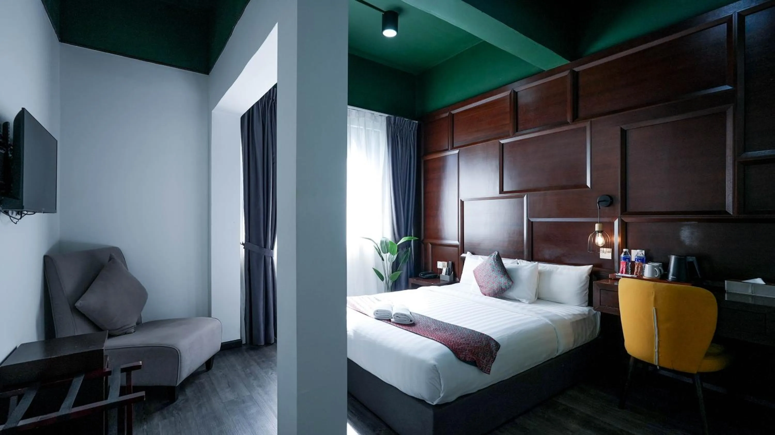 Seating area, Bed in East Riverine Boutique Hotel