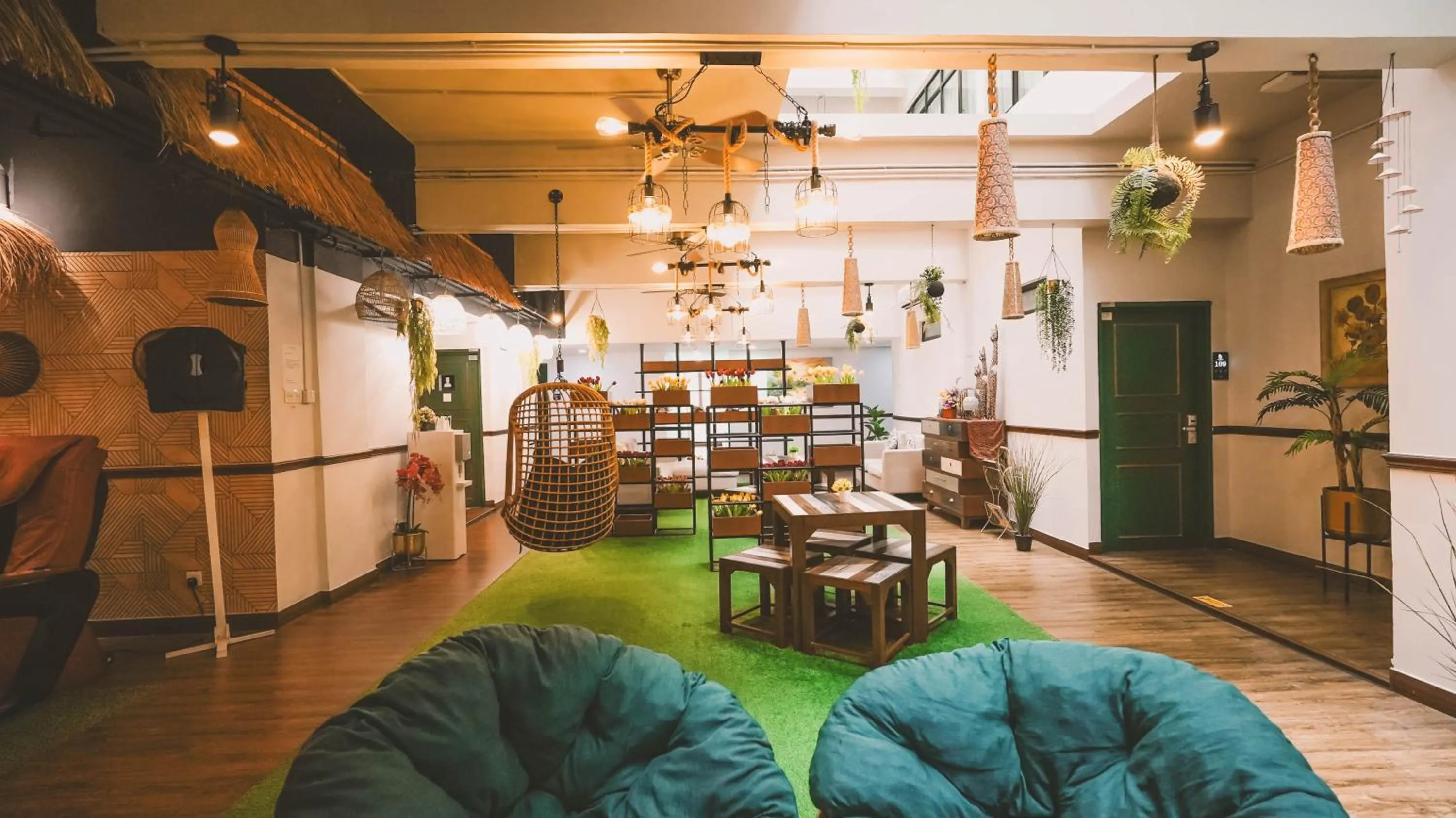 Communal lounge/ TV room in East Riverine Boutique Hotel