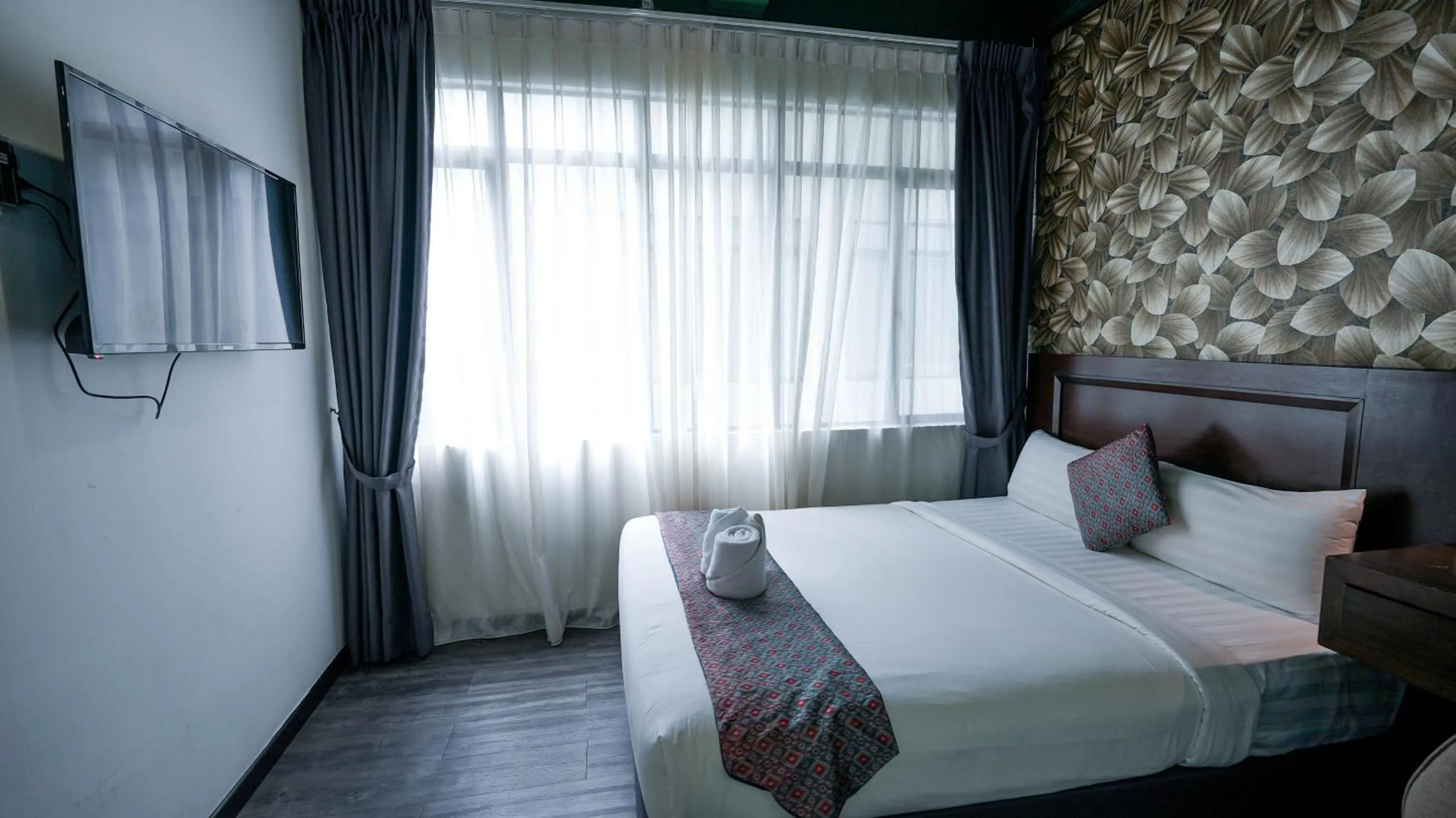 Bed in East Riverine Boutique Hotel