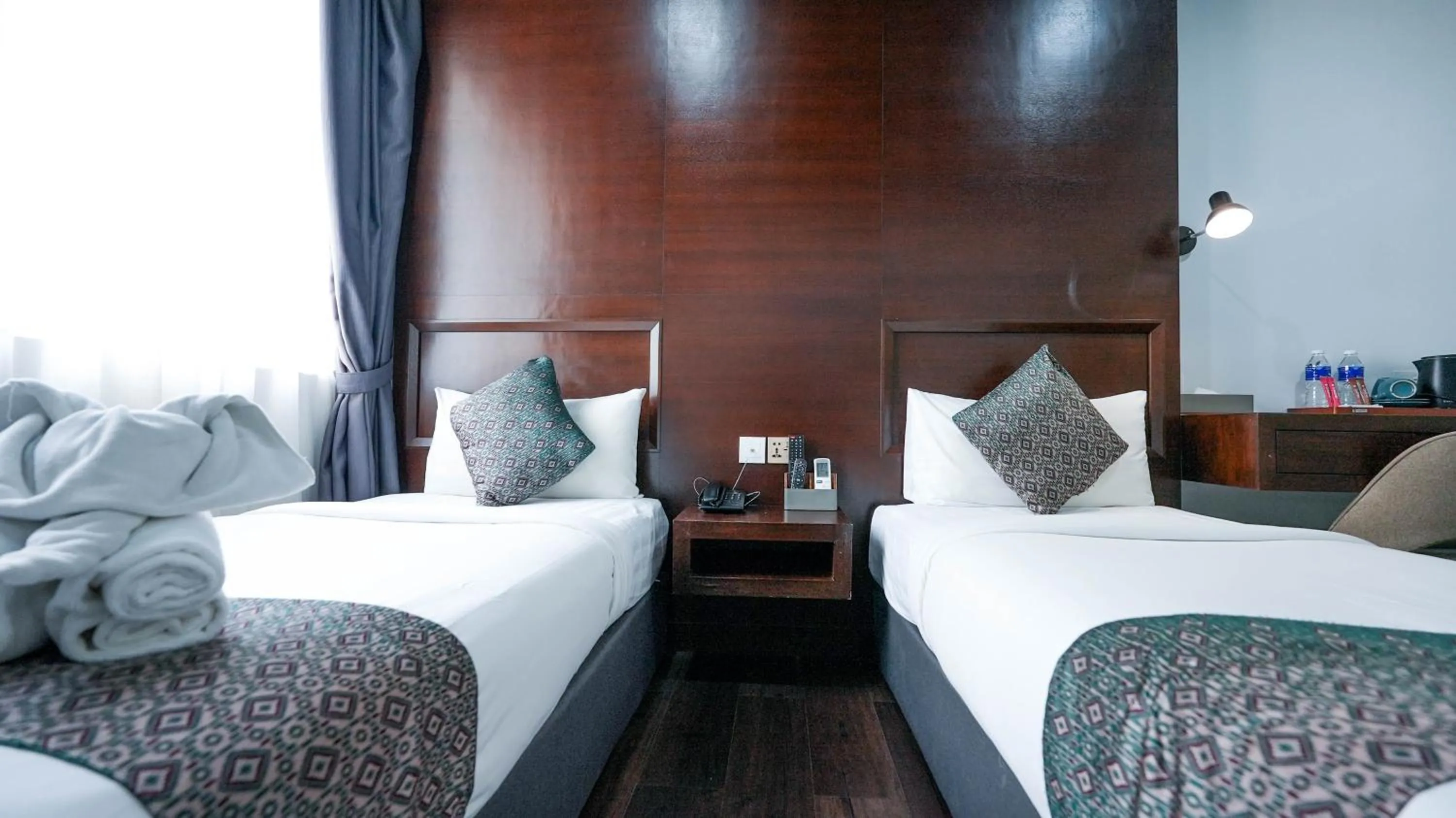 Bed in East Riverine Boutique Hotel