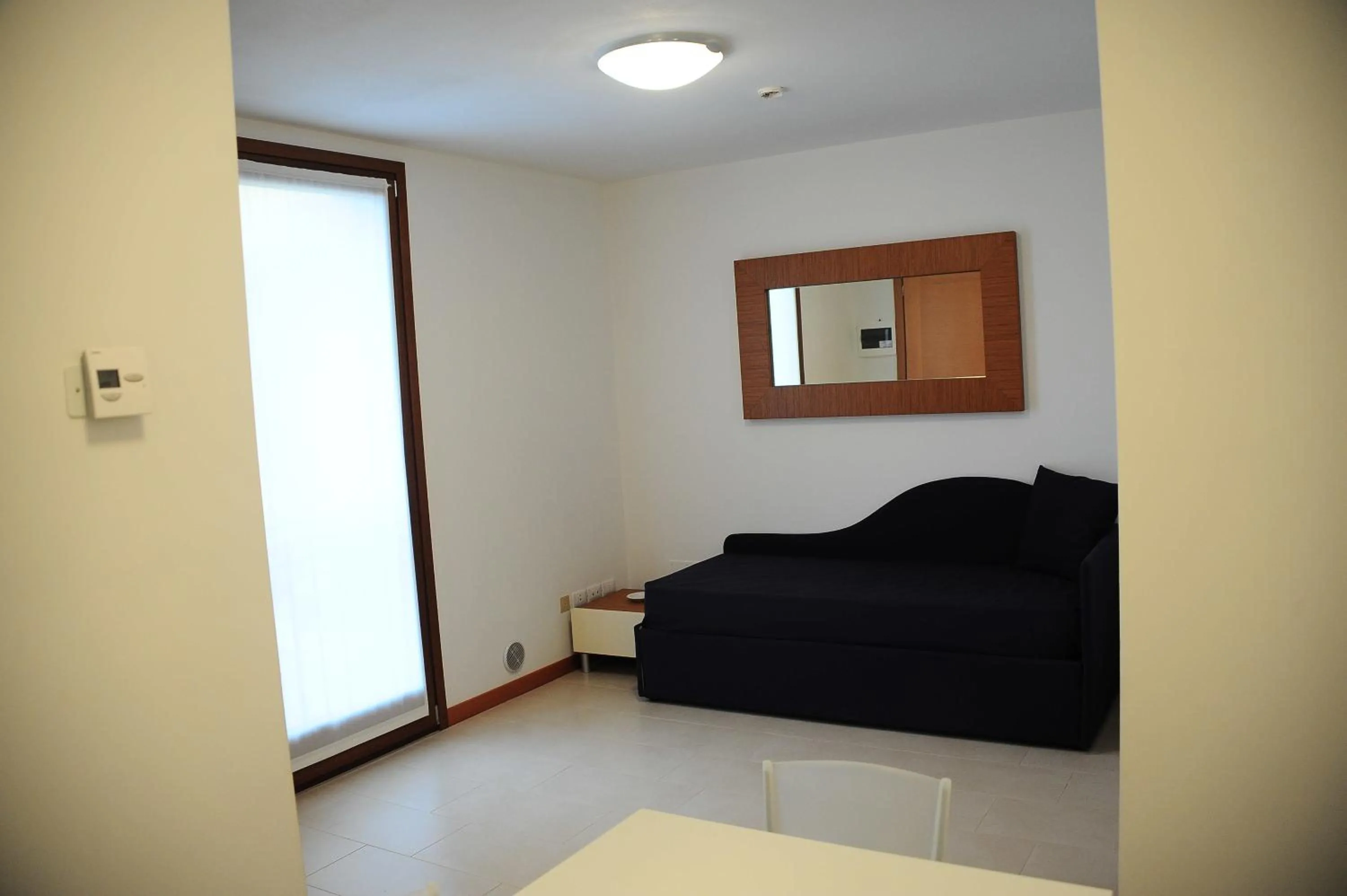 Living room, Bed in Suite Maria Residence