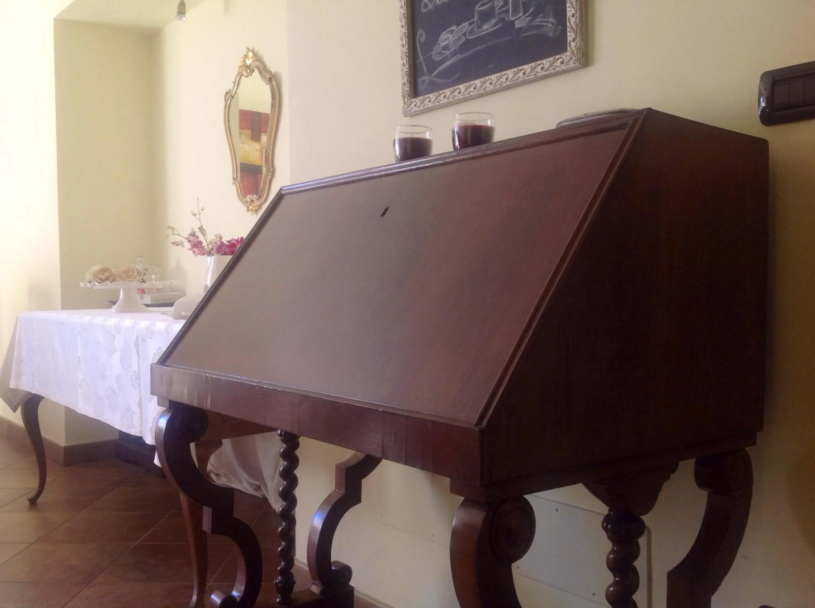 Communal lounge/ TV room in Room & Breakfast La Dimora