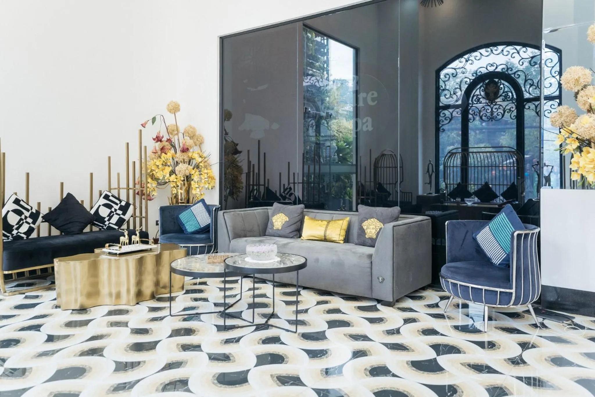 Lobby or reception in SureStay Hotel by Best Western Vientiane