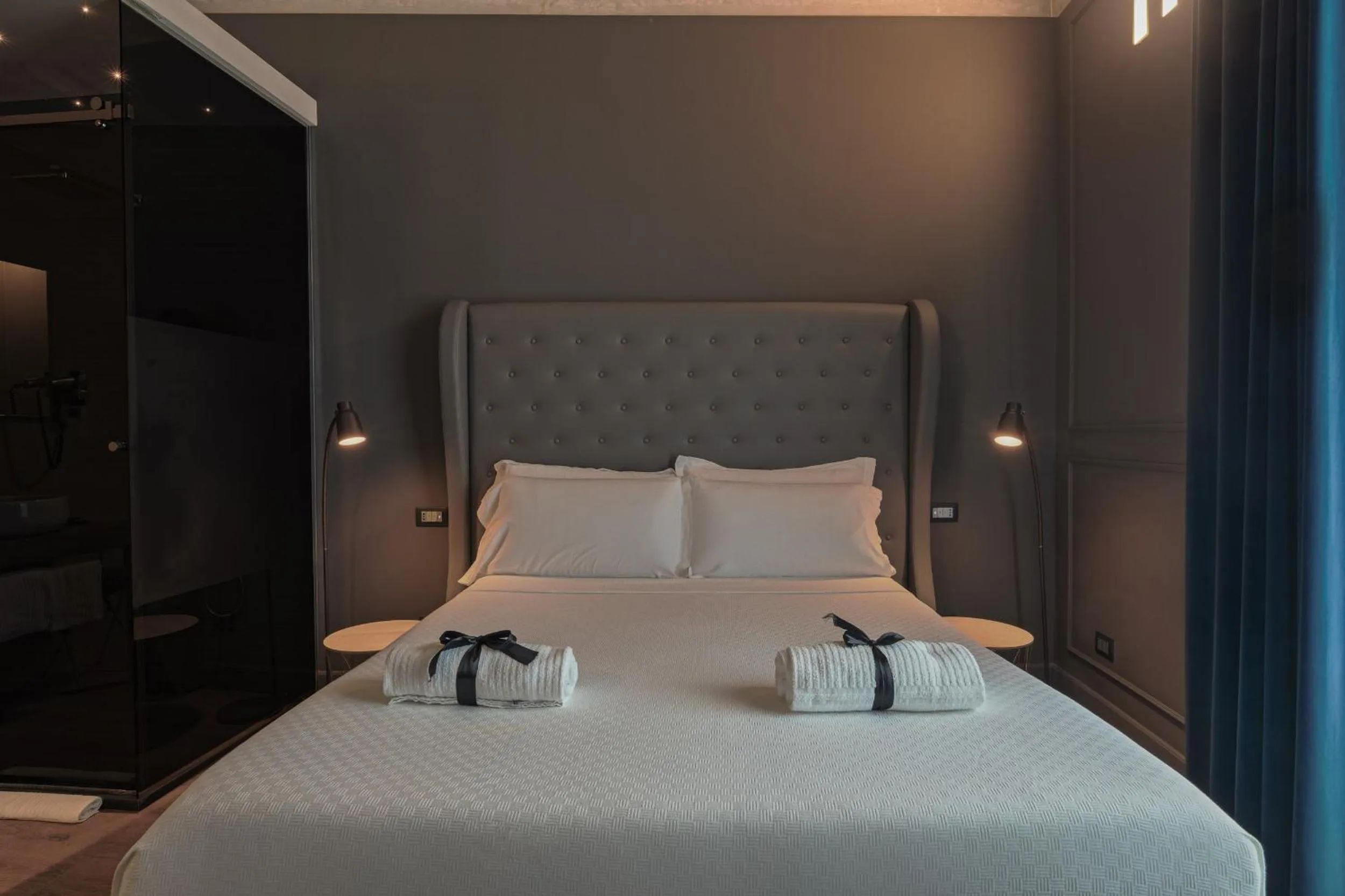 Bed in Palco Rooms&Suites