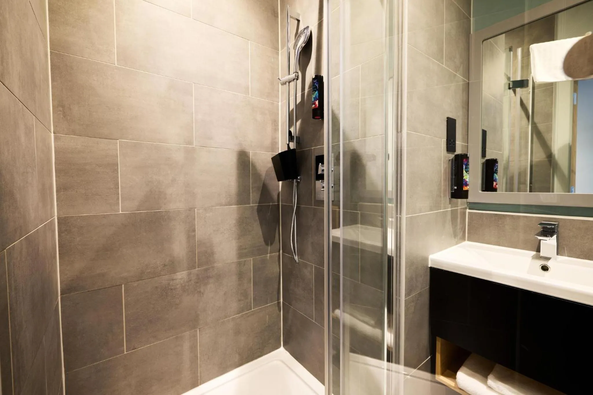 Bathroom in Holiday Inn - the niu, Loom Manchester North by IHG